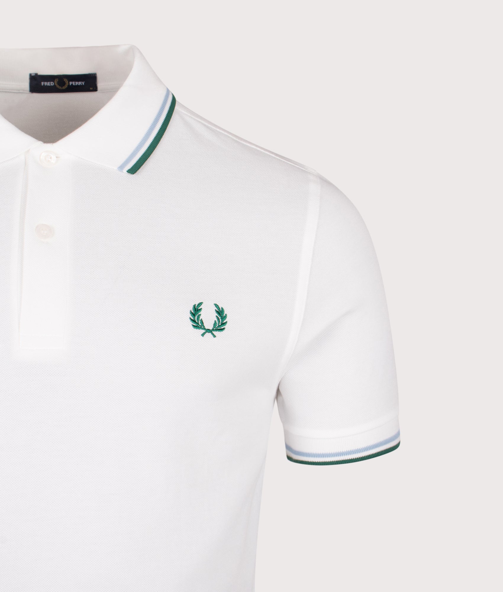 Twin Tipped Fred Perry Polo Shirt. Shot by EQVVS. Detail shot.