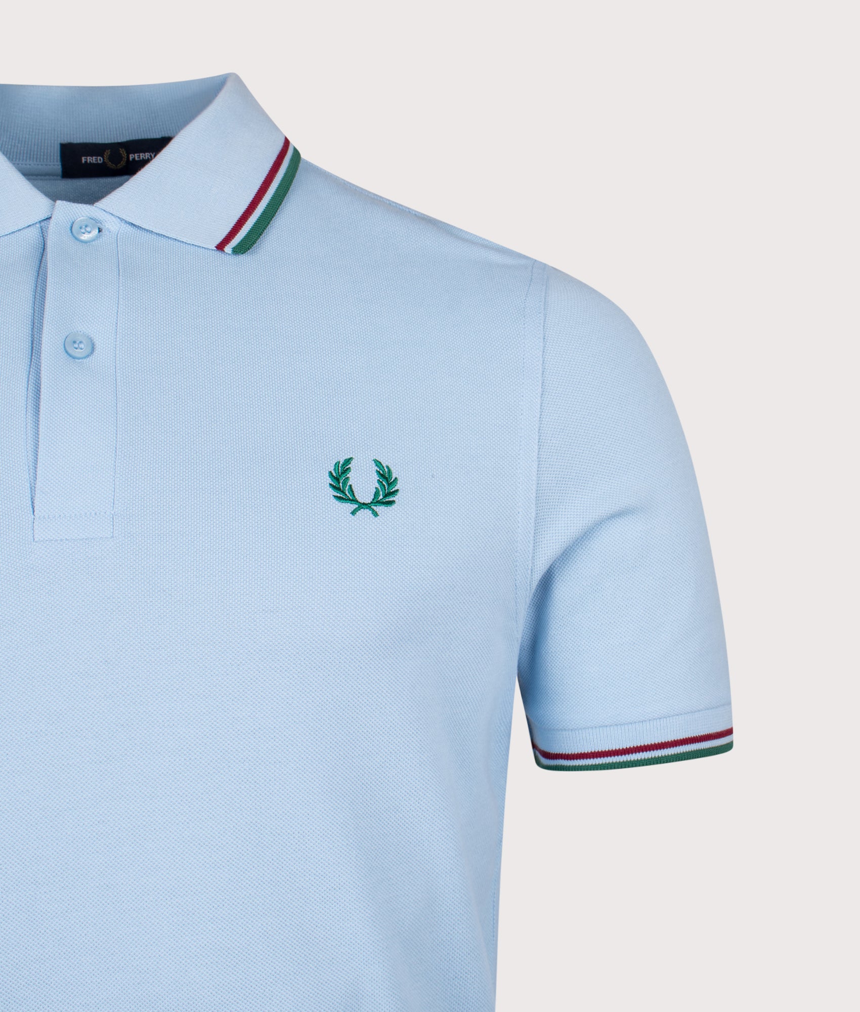 Twin Tipped Fred Perry Polo Shirt. Shot by EQVVS. Detail shot.