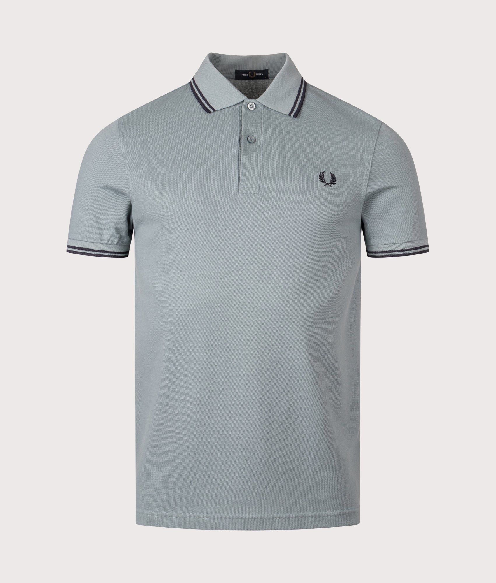 Twin Tipped Fred Perry Polo Shirt. Shot by EQVVS. Front shot.