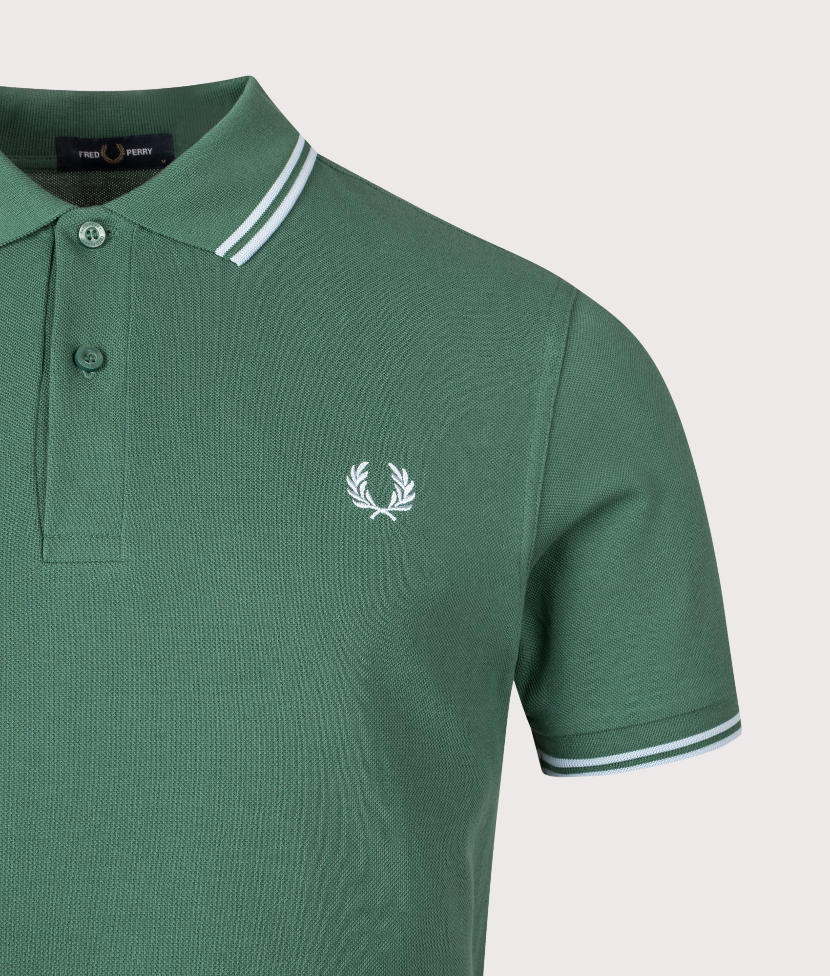 Twin Tipped Fred Perry Polo Shirt. Shot by EQVVS. Detail shot.