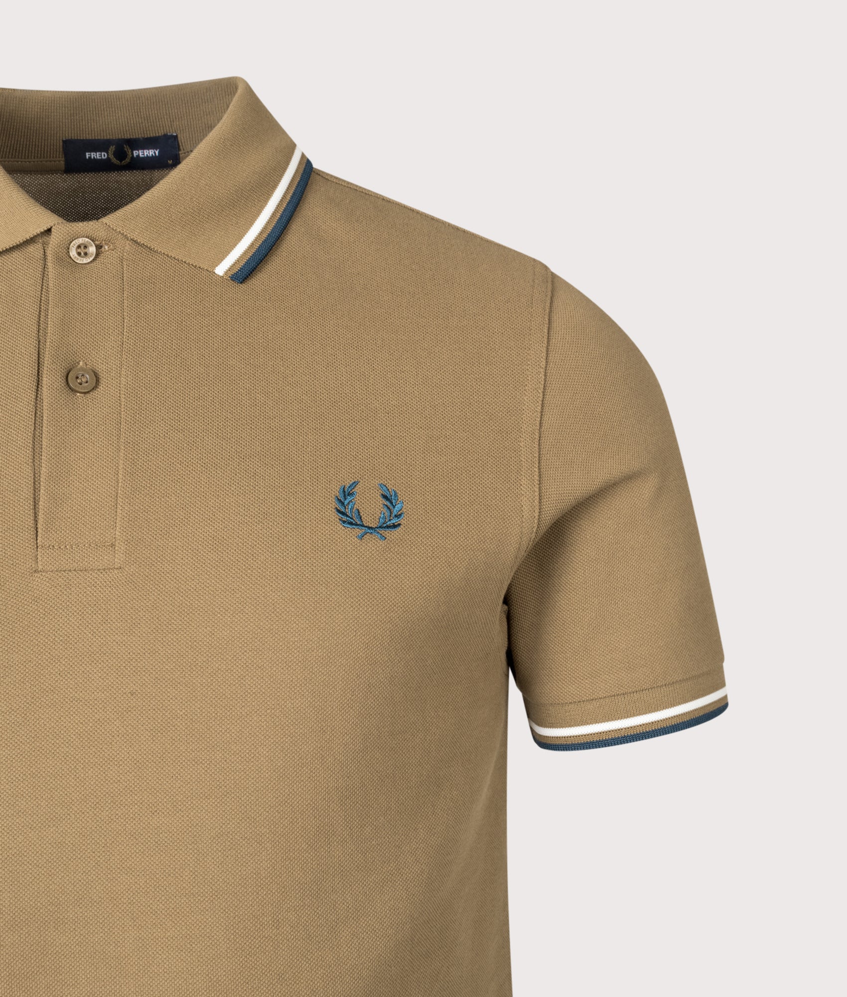 Twin Tipped Fred Perry Polo Shirt. Shot by EQVVS. Detail shot.