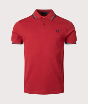 Twin Tipped Fred Perry Polo Shirt in Burnt Red/Sport Green/Navy | 100% Cotton | Shot at EQVVS |  Front shot 