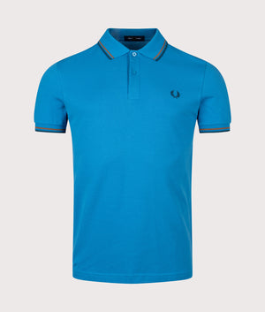 Twin Tipped Fred Perry Polo Shirt in Court Blue/Shaded Stone/Dark Petrol | 100% Cotton | Shot at EQVVS | Front shot 