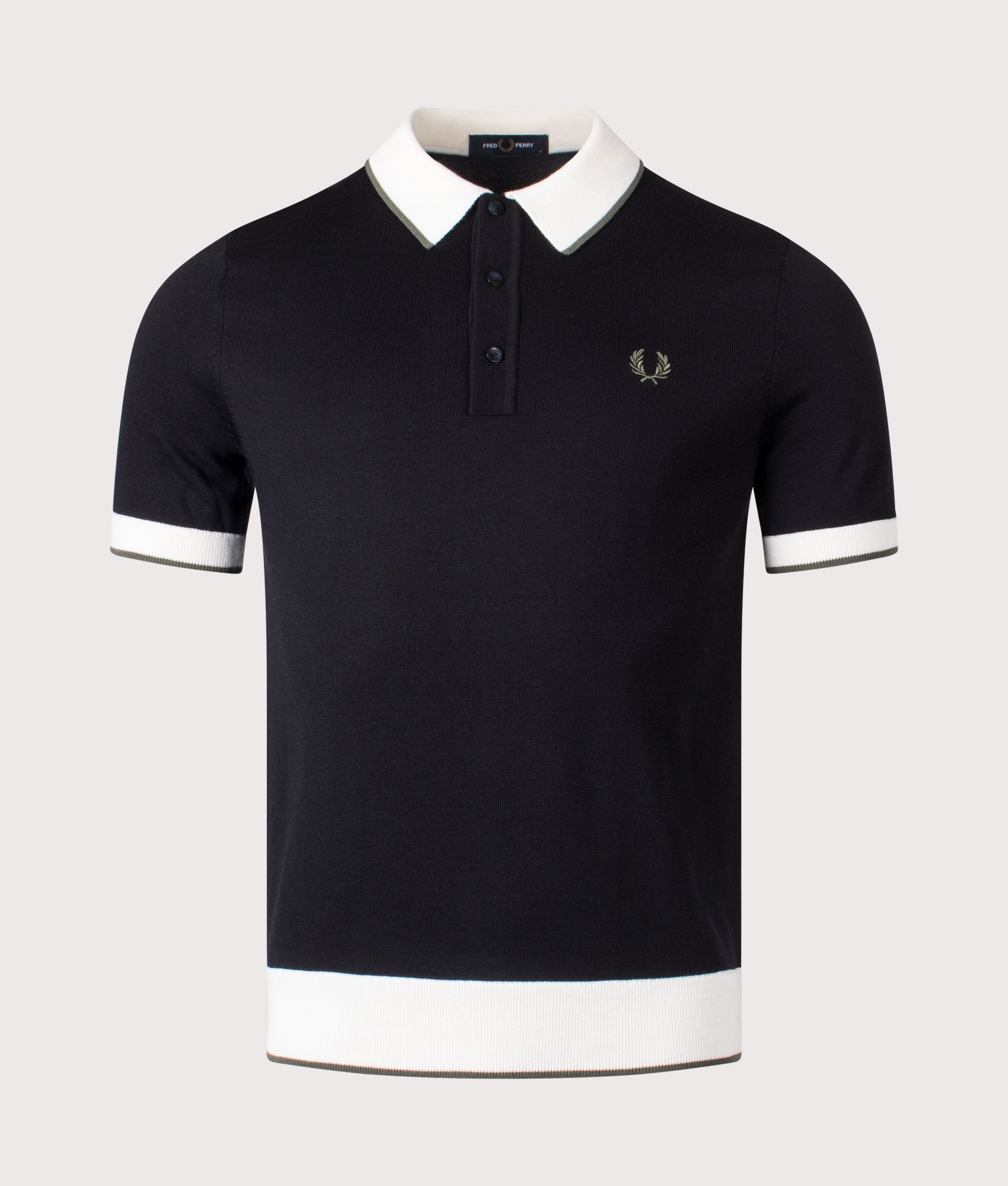 Fred Perry Contrast Tipped Knitted Polo Shirt in Black at EQVVS Menswear. Front shot.