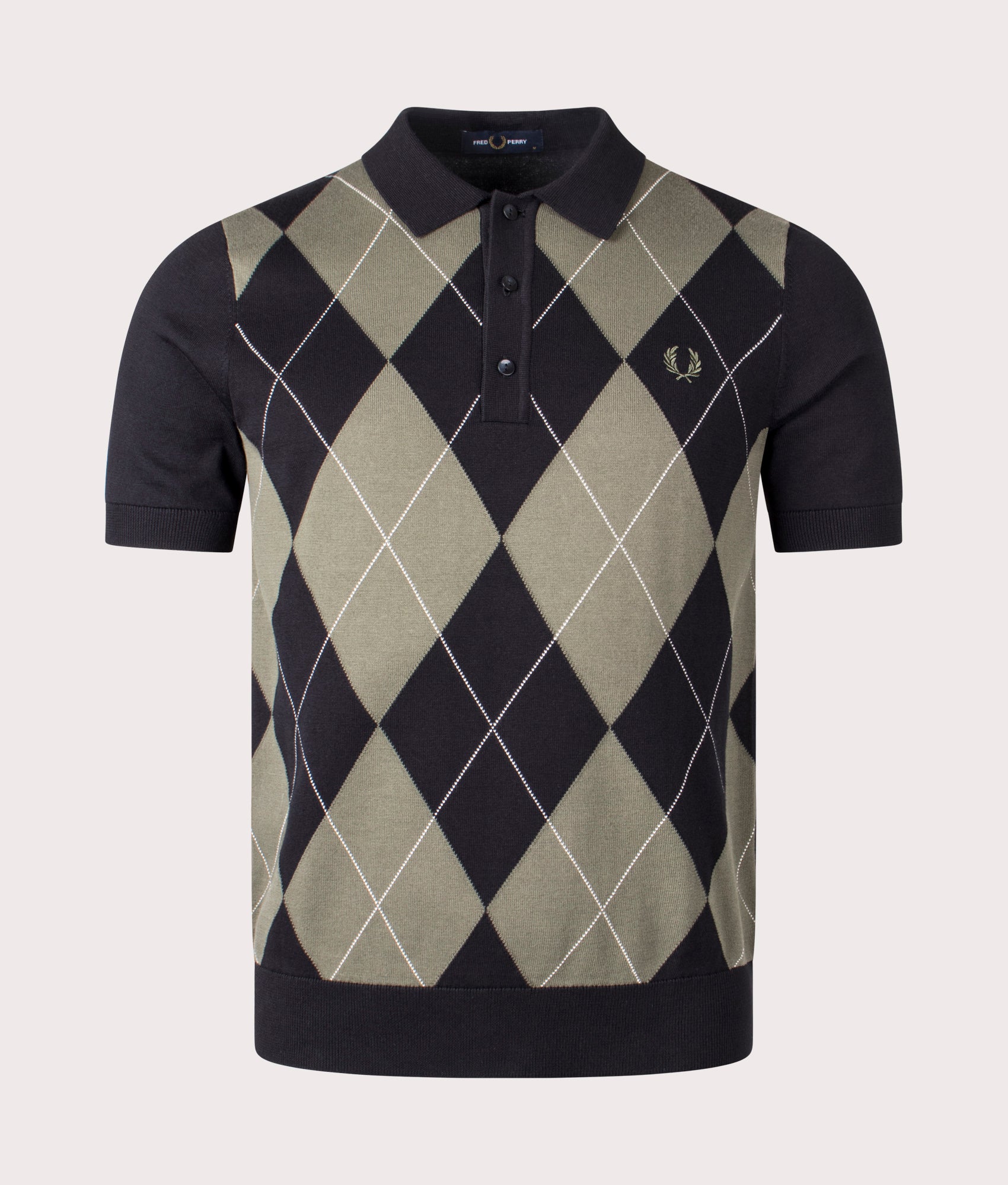 Argyle Knitted Polo Shirt by Fred Perry in Black. Shot by EQVVS. Front shot.