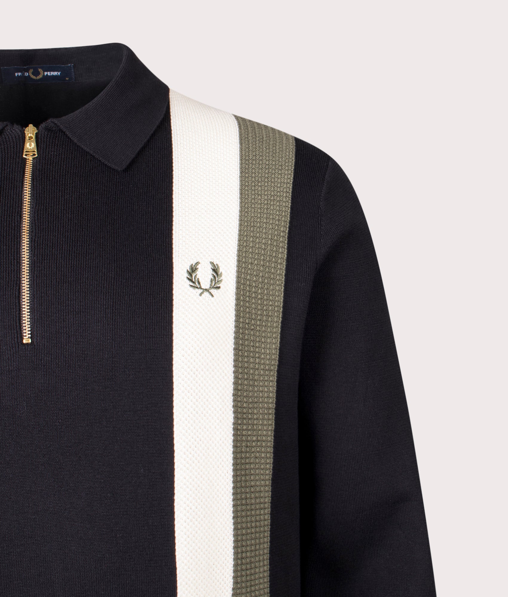 Textured Zip Neck Knitted Long Sleeve Polo Shirt by Fred Perry in Black. Shot by EQVVS. Detail shot.