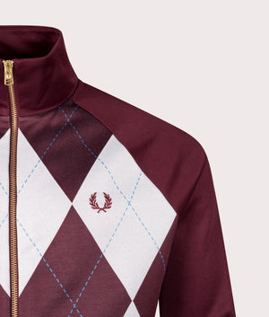 Argyle Track Jacket by Fred Perry in Oxblood. Shot by EQVVS. Detail shot.