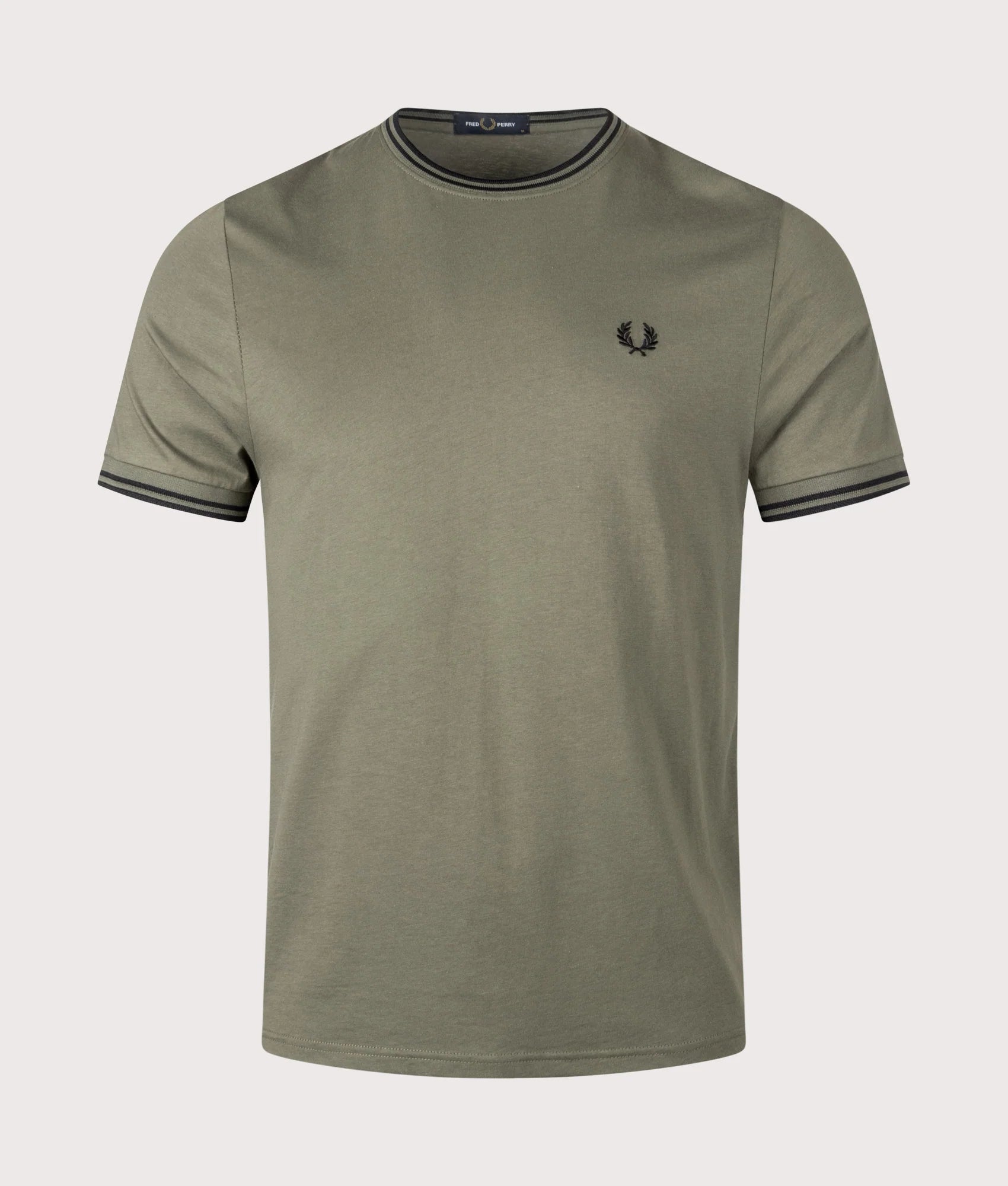 Fred Perry Twin Tipped T-Shirt in Laurel Wreath Green and Black at EQVVS Menswear. Front shot.