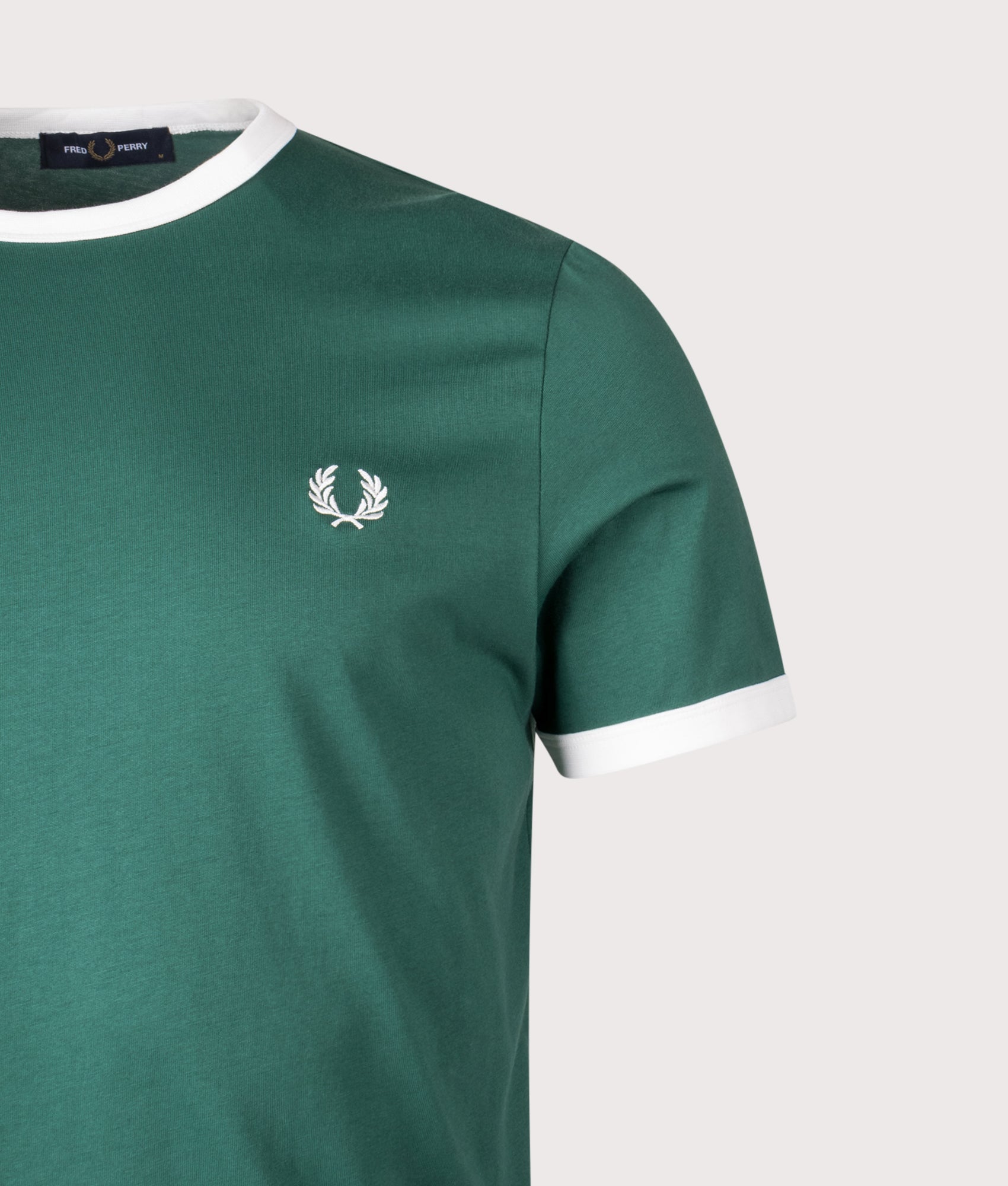 Fred Perry Ringer T-Shirt in Sports Green/Snow White at EQVVS Menswear. Detail Shot