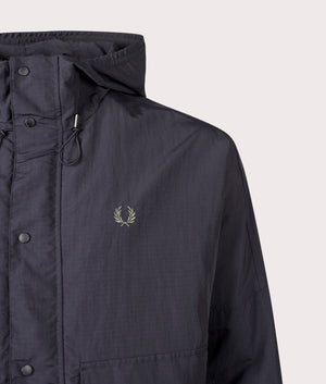 Cropped Ripstop Parka by Fred Perry in Black. hot by EQVVS. Detail shot.