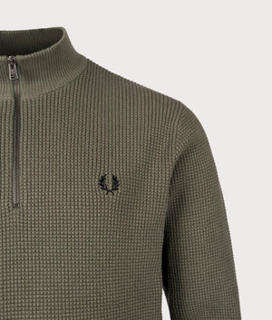 Waffle Stitch Quarter Zip Jumper by Fred Perry in Laurel Wreath Green. Shot by EQVVS. Detail shot.