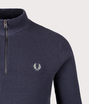 Waffle Stitch Quarter Zip Jumper by Fred Perry in Dark Airforce. Shot by EQVVS. Detail shot.