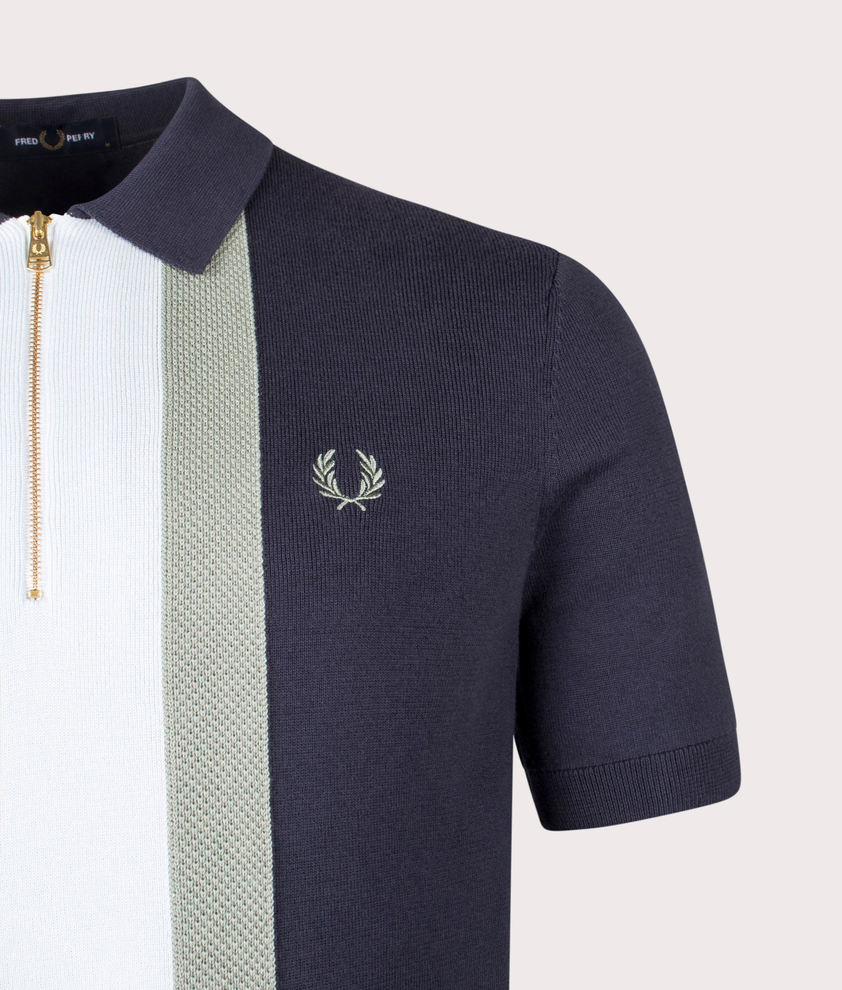 Textured Stripe Zip Neck Knitted Polo Shirt by Fred Perry in Dark Airforce. Shot by EQVVS. Detail shot.
