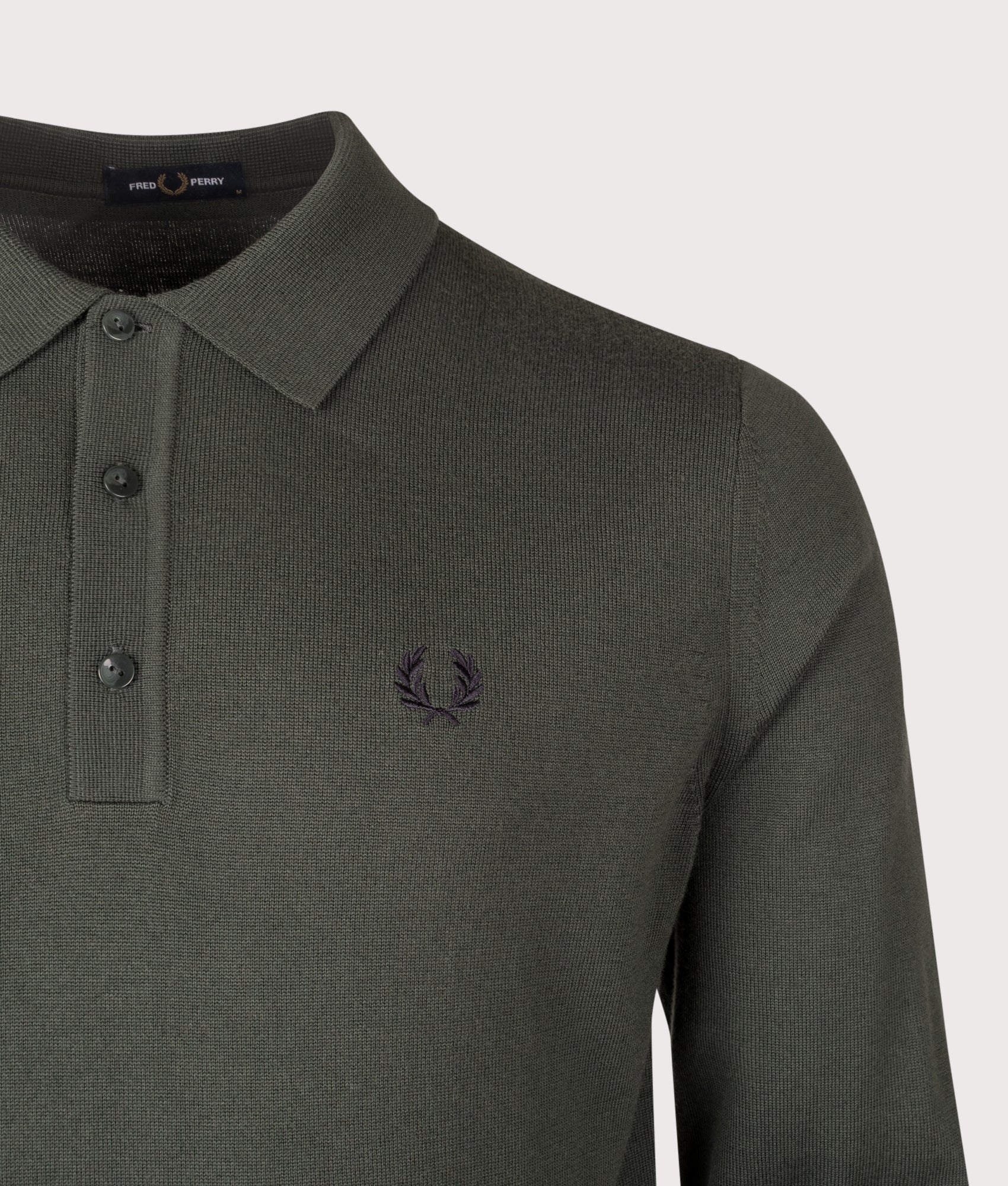 Long Sleeve Knitted Polo Shirt in Court Green | Wool and cotton blend | Fred Perry | EQVVS | Front detail shot 
