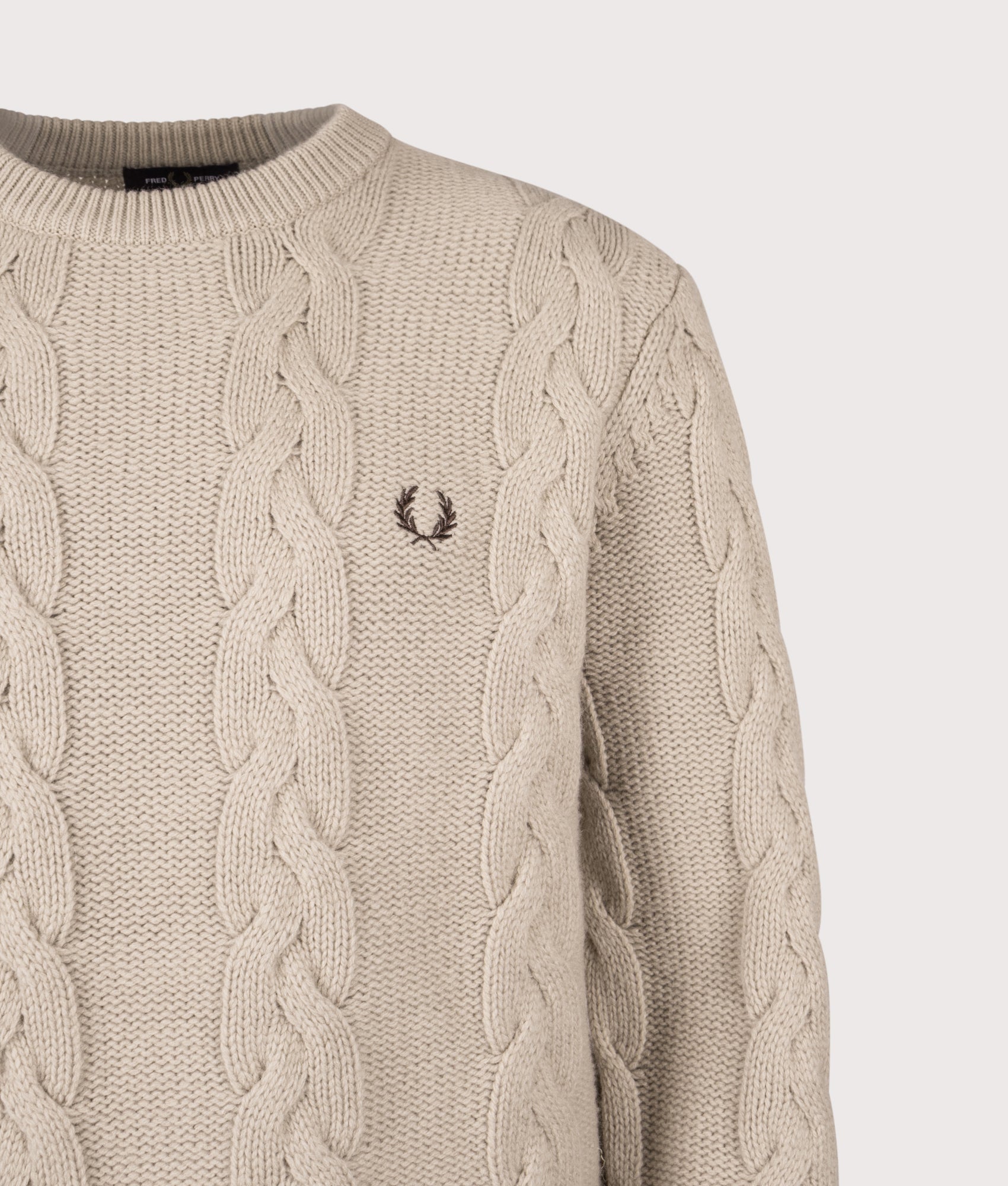 Fred Perry Chunky Cable Knit Jumper in Warm Oat at EQVVS Menswear. Detail shot.