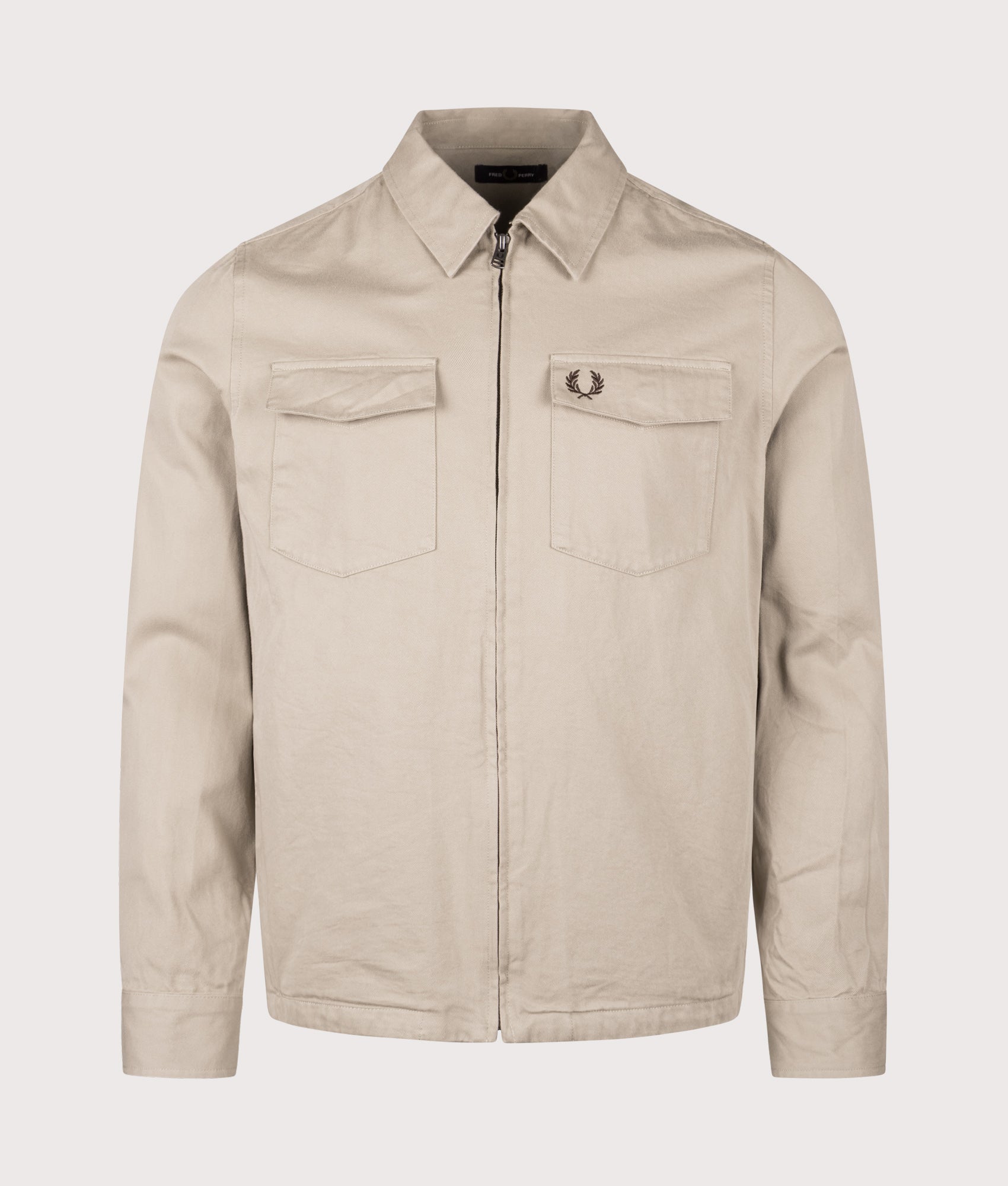 Fred Perry Twill Zip Through Overshirt in Warm Oat at EQVVS Menswear. Front shot.
