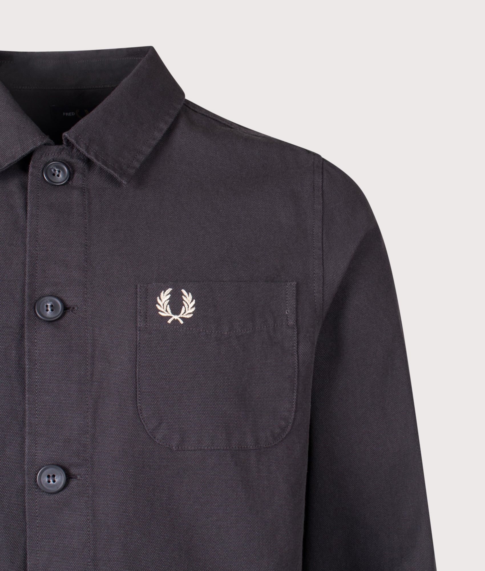 Fred Perry Canvas Overshirt in Anchor Grey at EQVVS Menswear. Detail shot.