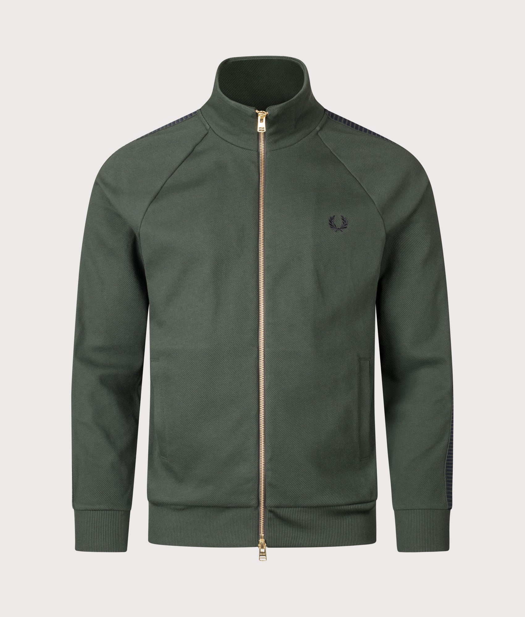 Fred Perry Dash Taped Track Jacket in Court Green at EQVVS Menswear. Front shot.