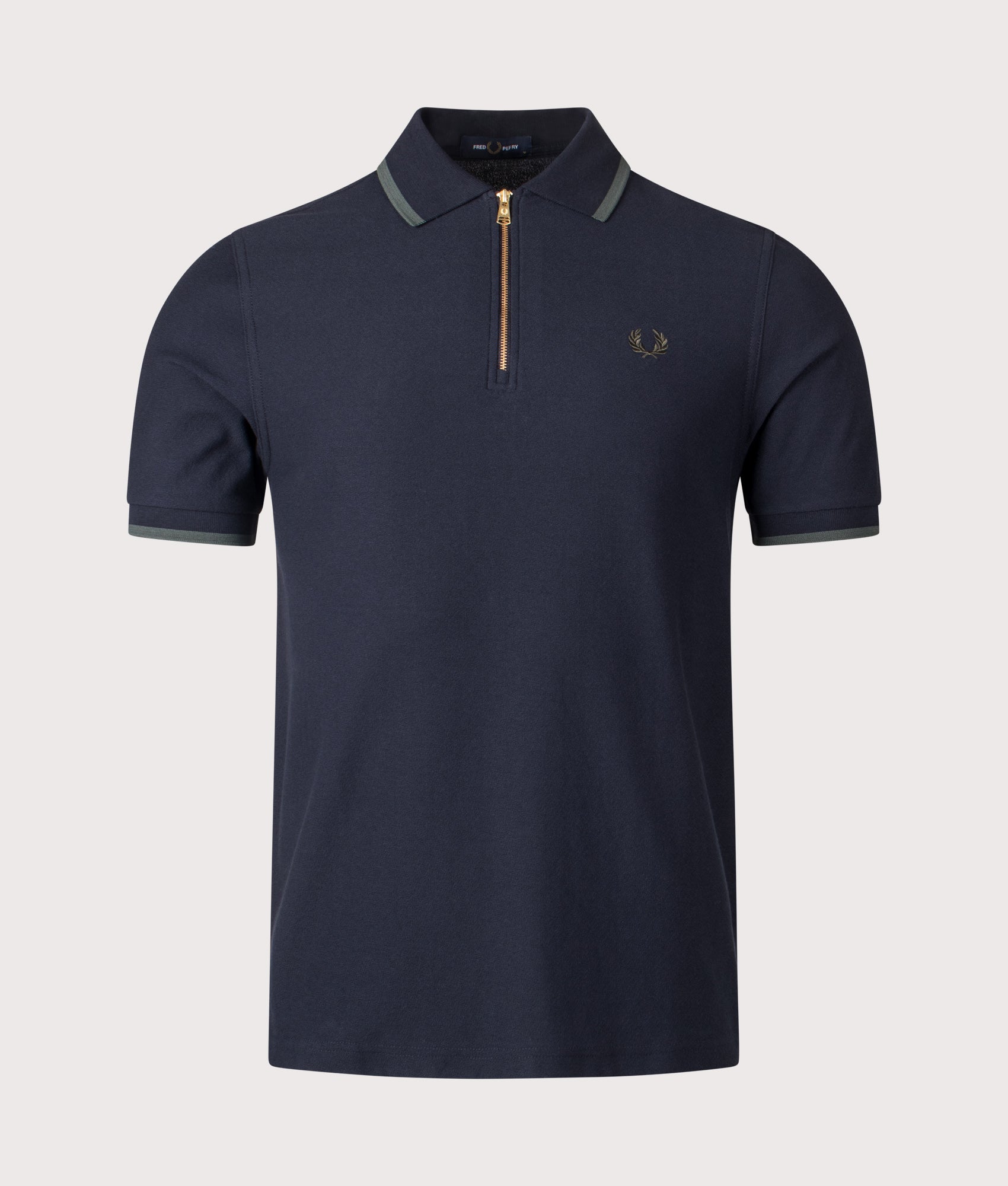 Fred Perry Crepe Piqué Polo Shirt in Navy at EQVVS Menswear. Front shot.