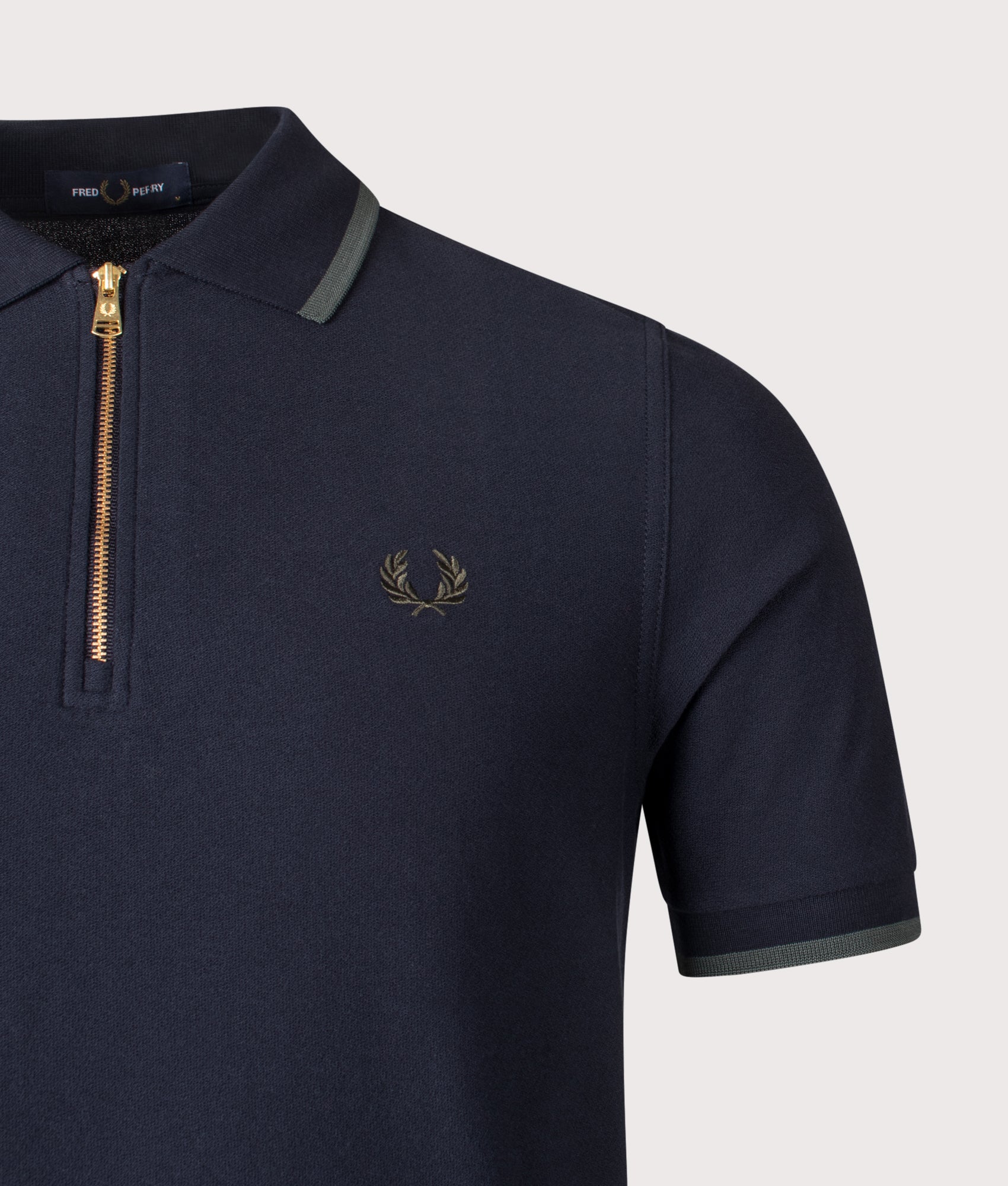 Fred Perry Crepe Piqué Polo Shirt in Navy at EQVVS Menswear. Detail shot.
