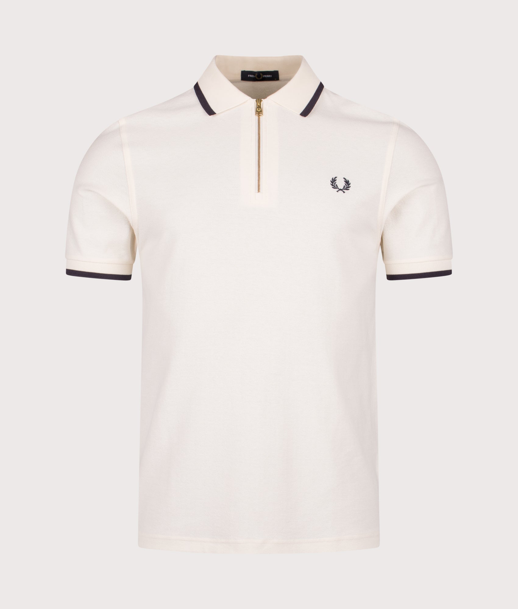 Fred Perry Crepe Piqué Polo Shirt in Ecru at EQVVS Menswear. Front shot. 