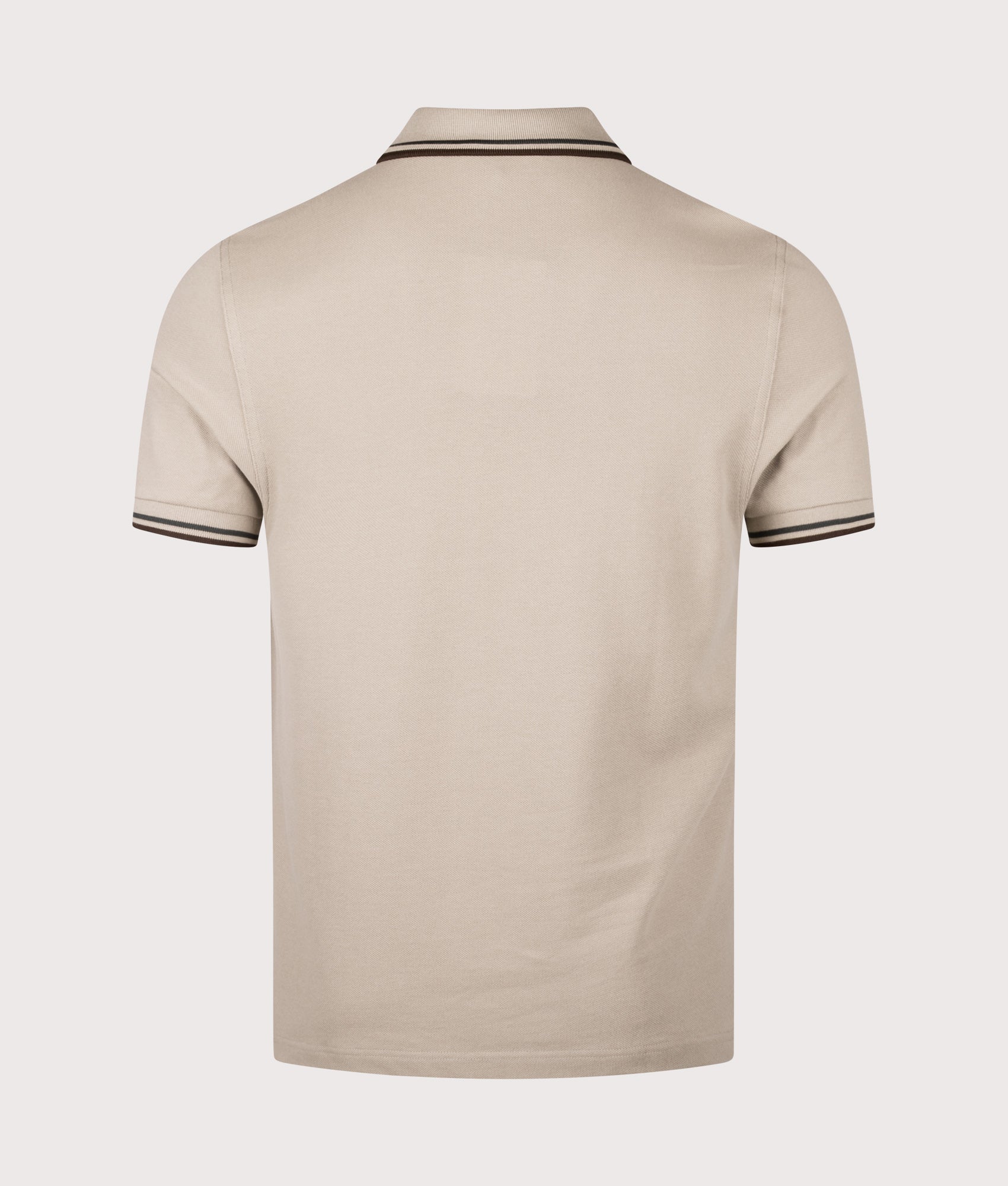 Fred Perry Twin Tipped Polo Shirt in Warm Oat, Court Green and Burnt Tobacco at EQVVS Menswear. Back shot.