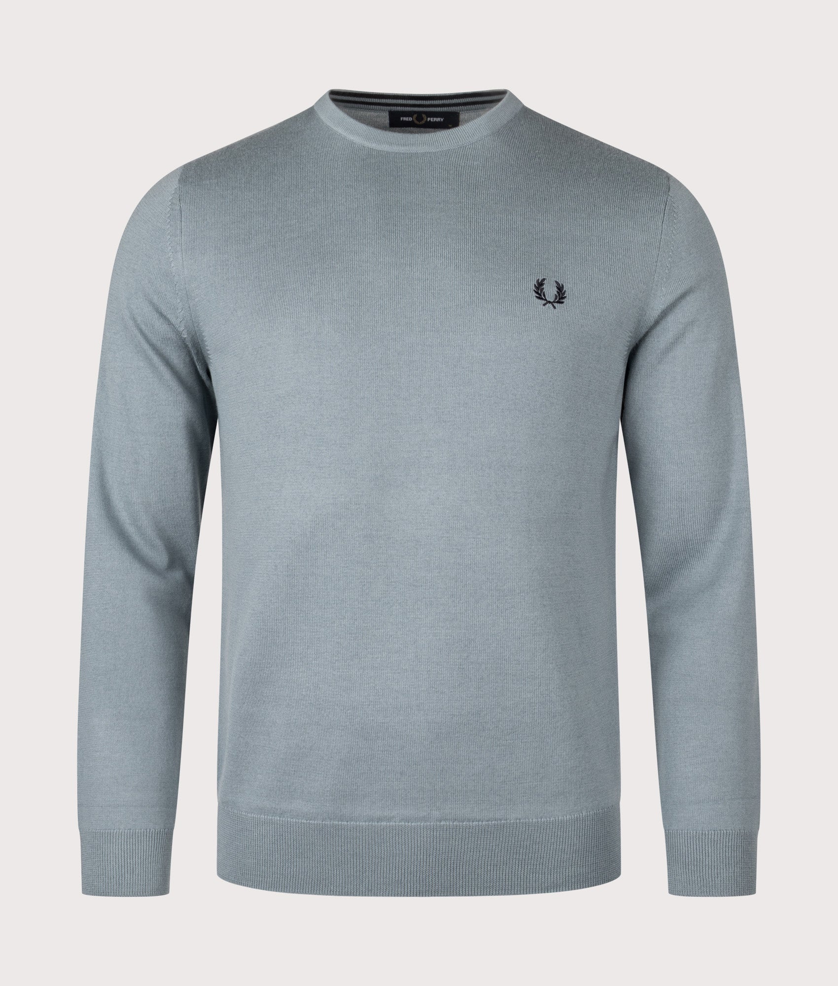 Fred Perry Classic Crew Neck Jumper in Stockport Blue at EQVVS Menswear. Front shot.