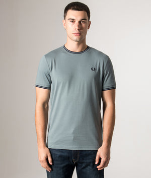 Fred Perry Twin Tipped T-Shirt in Stockport Blue/Navy/Navy at EQVVS Menswear. Model front shot.