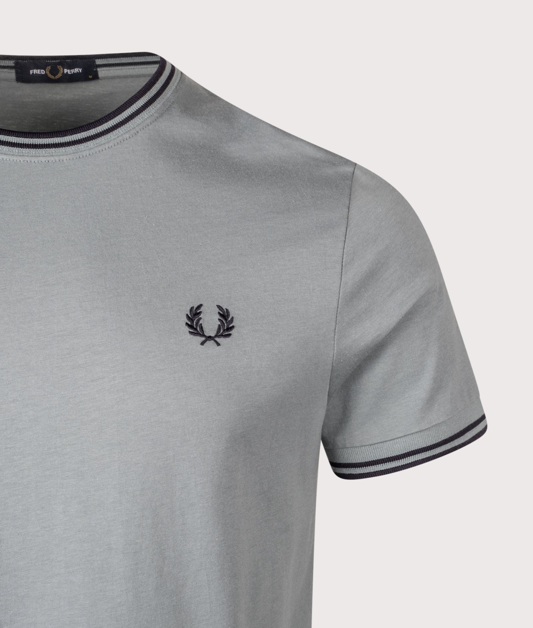 Fred Perry Twin Tipped T-Shirt in Stockport Blue/Navy/Navy at EQVVS Menswear. Front detail shot.