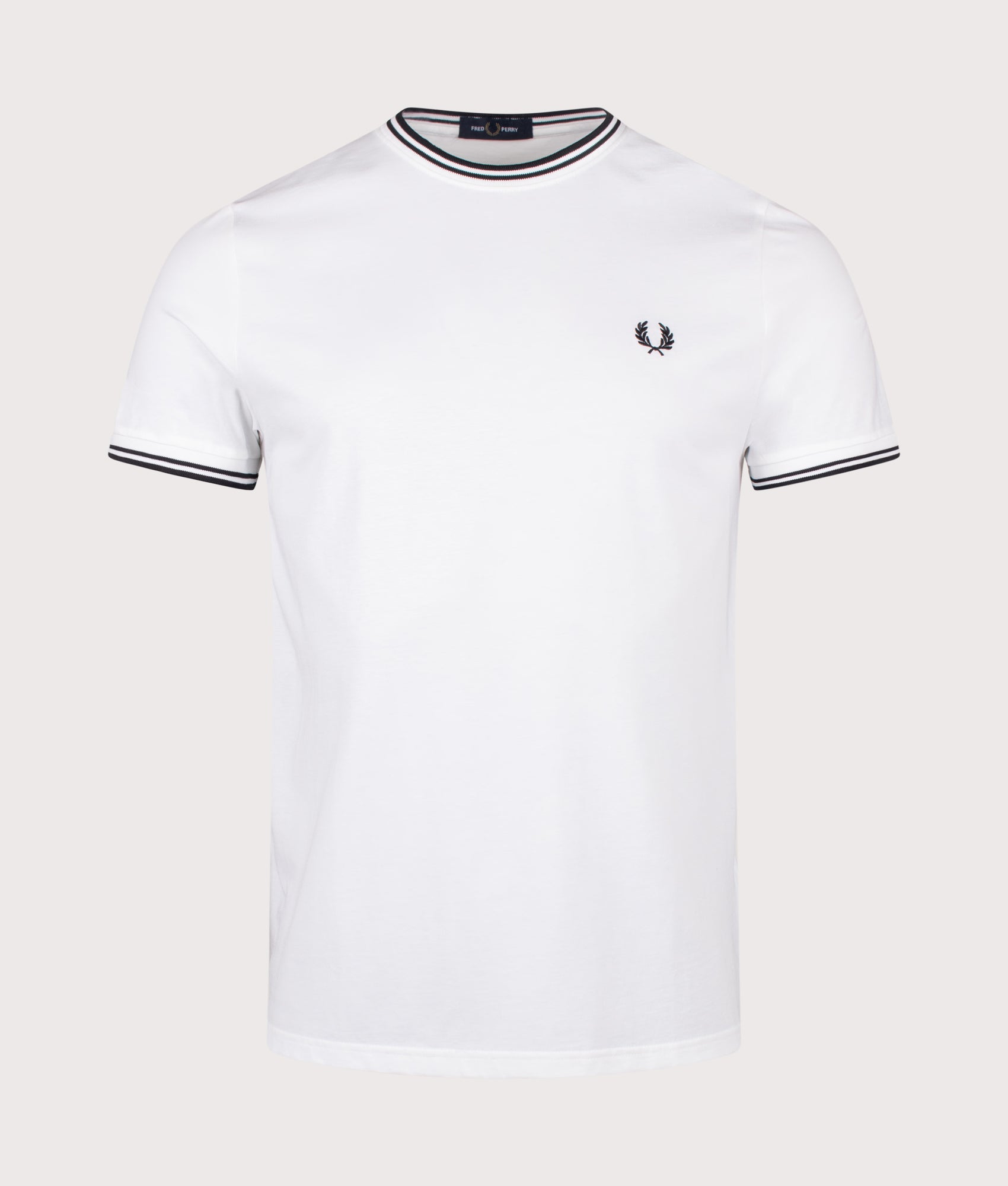 Fred Perry Twin Tipped T-Shirt in White at EQVVS Menswear. Front shot.