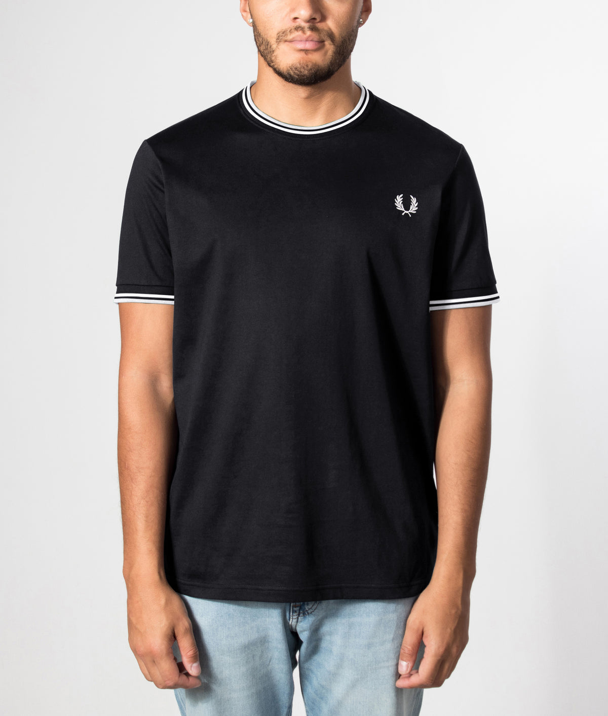 Twin Tipped T-Shirt in Black by Fred Perry. Front model shot. Shot By EQVVS.