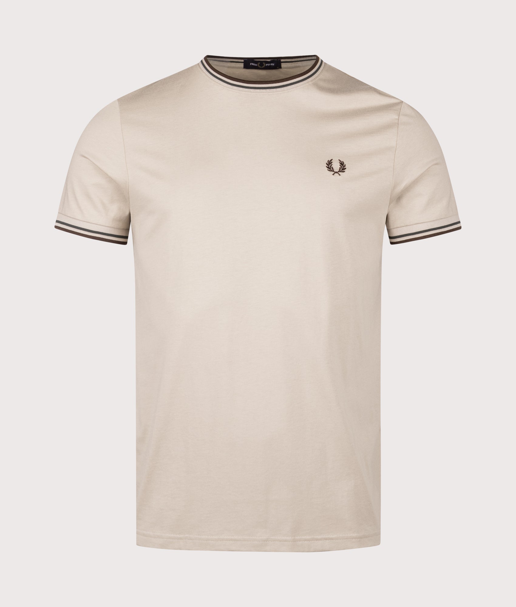 Fred Perry Twin Tipped T-Shirt in Warm Oat, Court Green and Burnt Tobacco at EQVVS Menswear. Front shot.