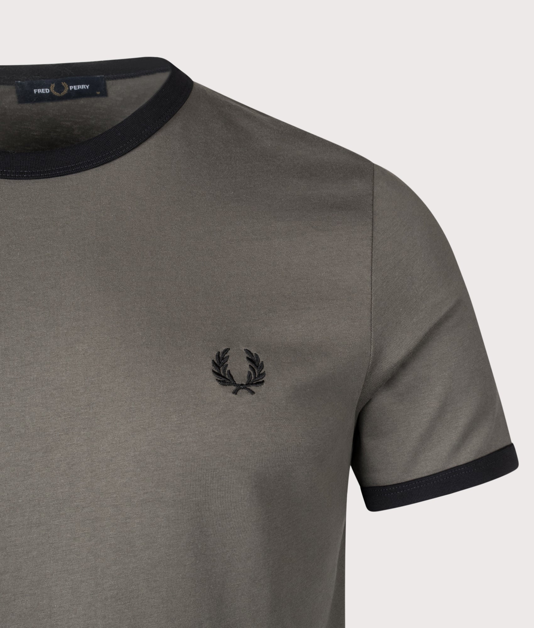 Ringer T-Shirt in Field Green/Black | 100% Cotton | Fred Perry | EQVVS | Front detail shot 