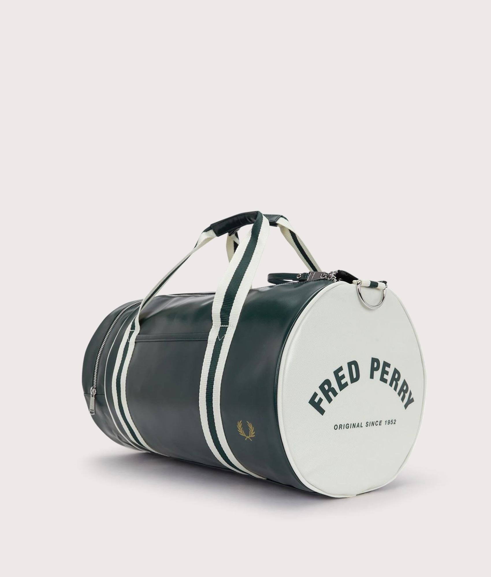 Fred Perry Classic Barrel Bag in Grassroots and Ecru at EQVVS Menswear. Angled front shot.