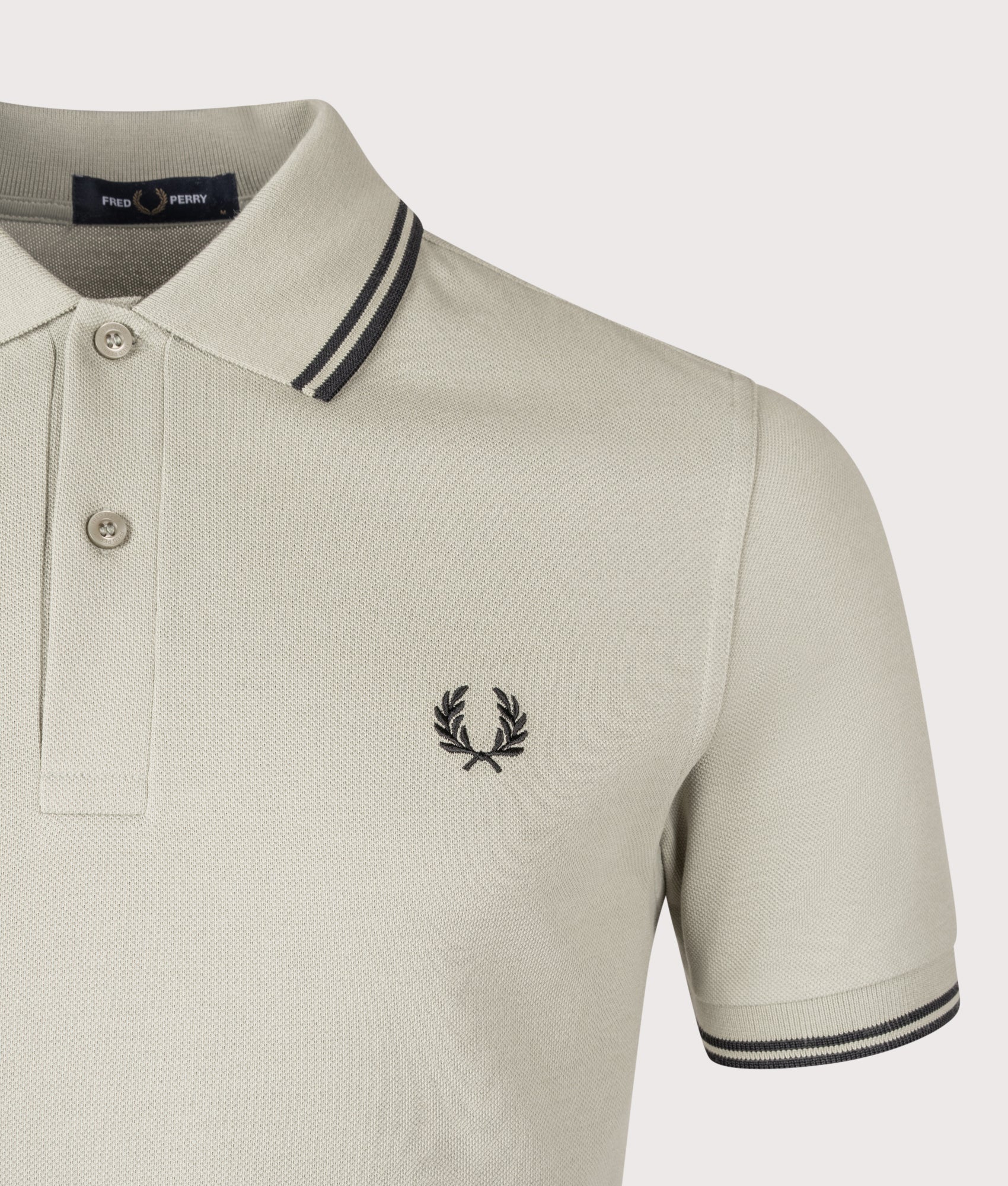 Fred Perry Twin Tipped Fred Perry Shirt in Seagrass and Black at EQVVS Menswear. Detail shot.
