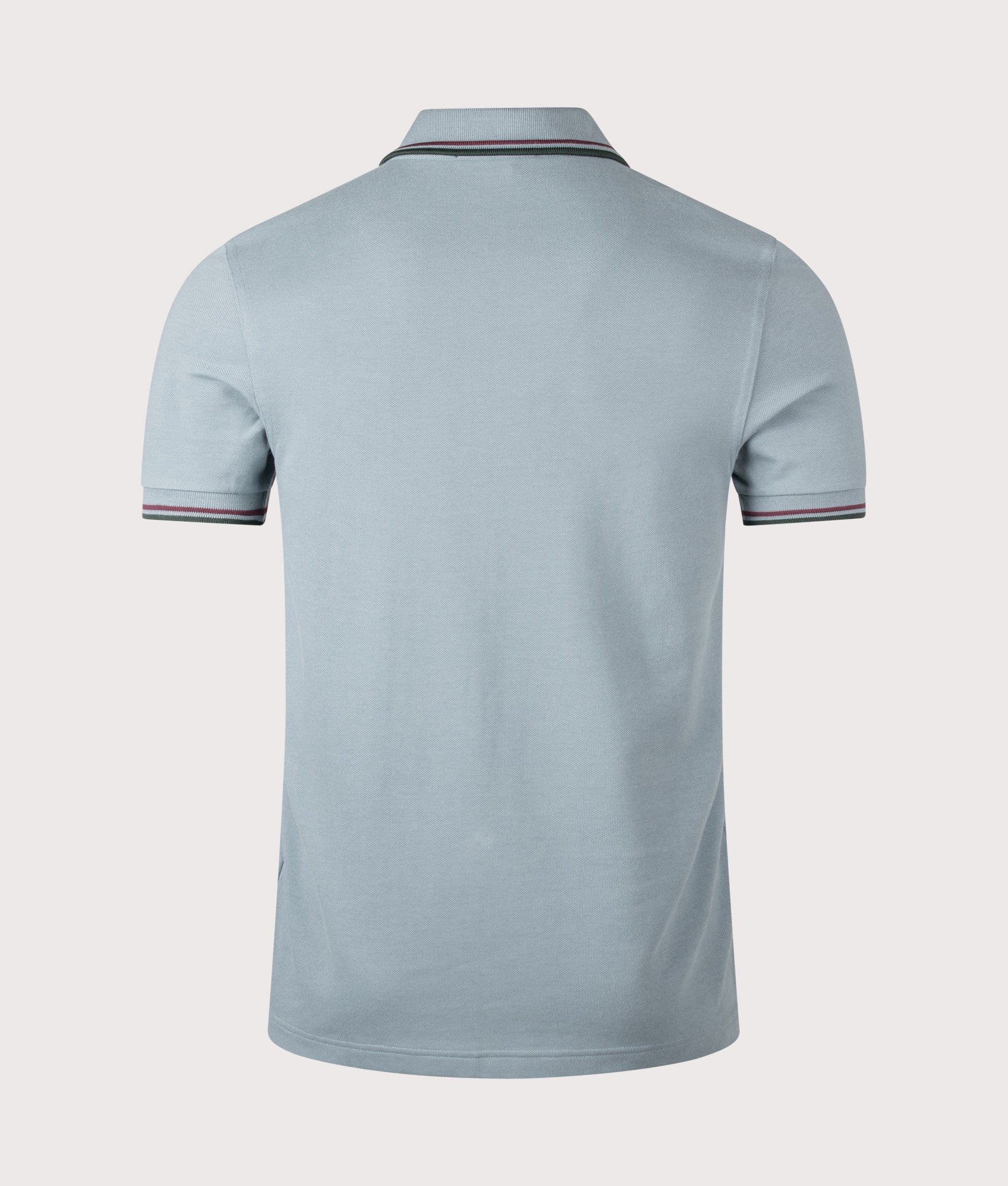 Fred Perry Twin Tipped Fred Perry Polo Shirt in Stockport Blue, Oxblood and Grassroots at EQVVS Menswear. Back shot.