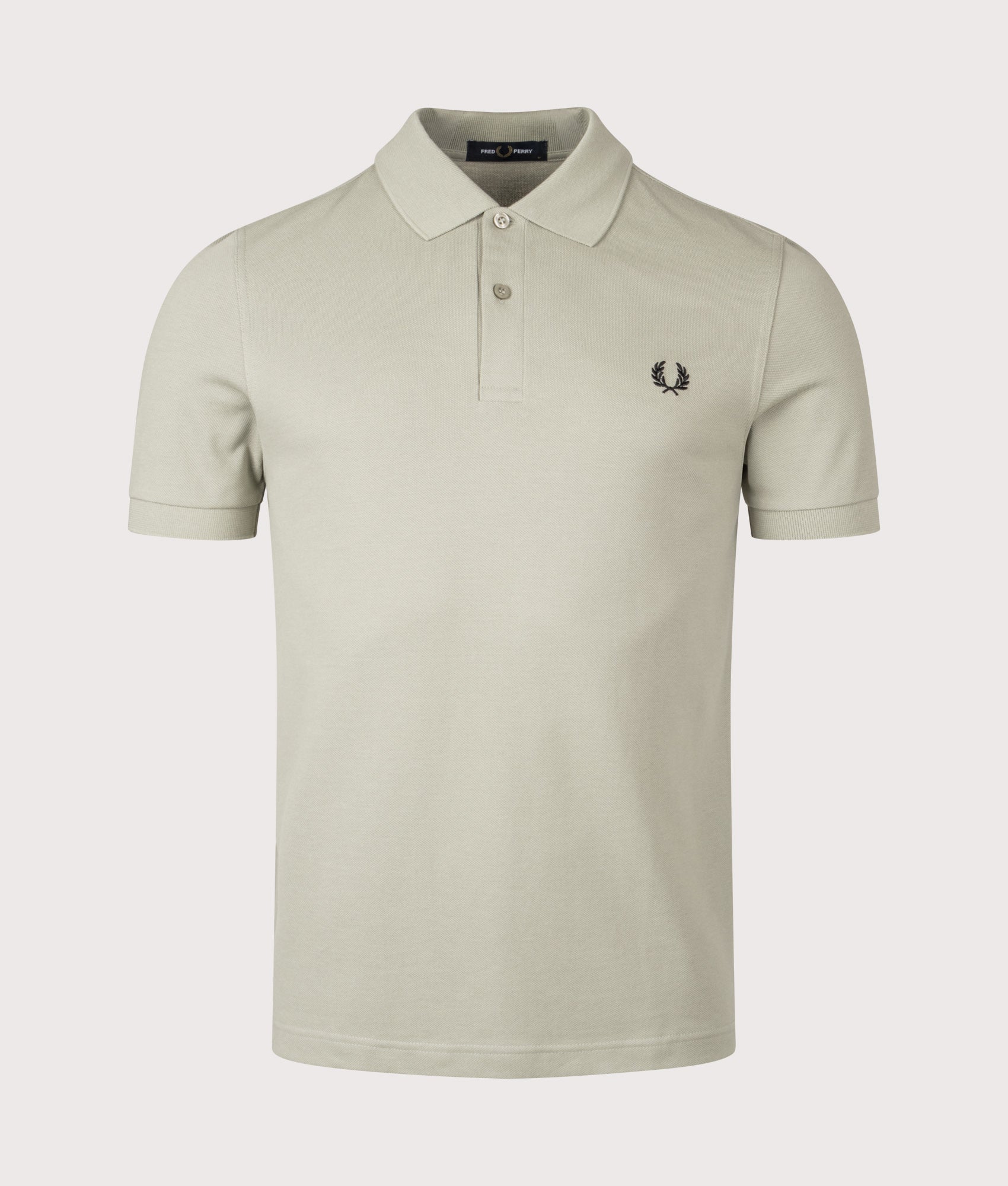 Fred Perry The Fred Perry Polo Shirt in Seagrass and Black at EQVVS Menswear. Front shot.