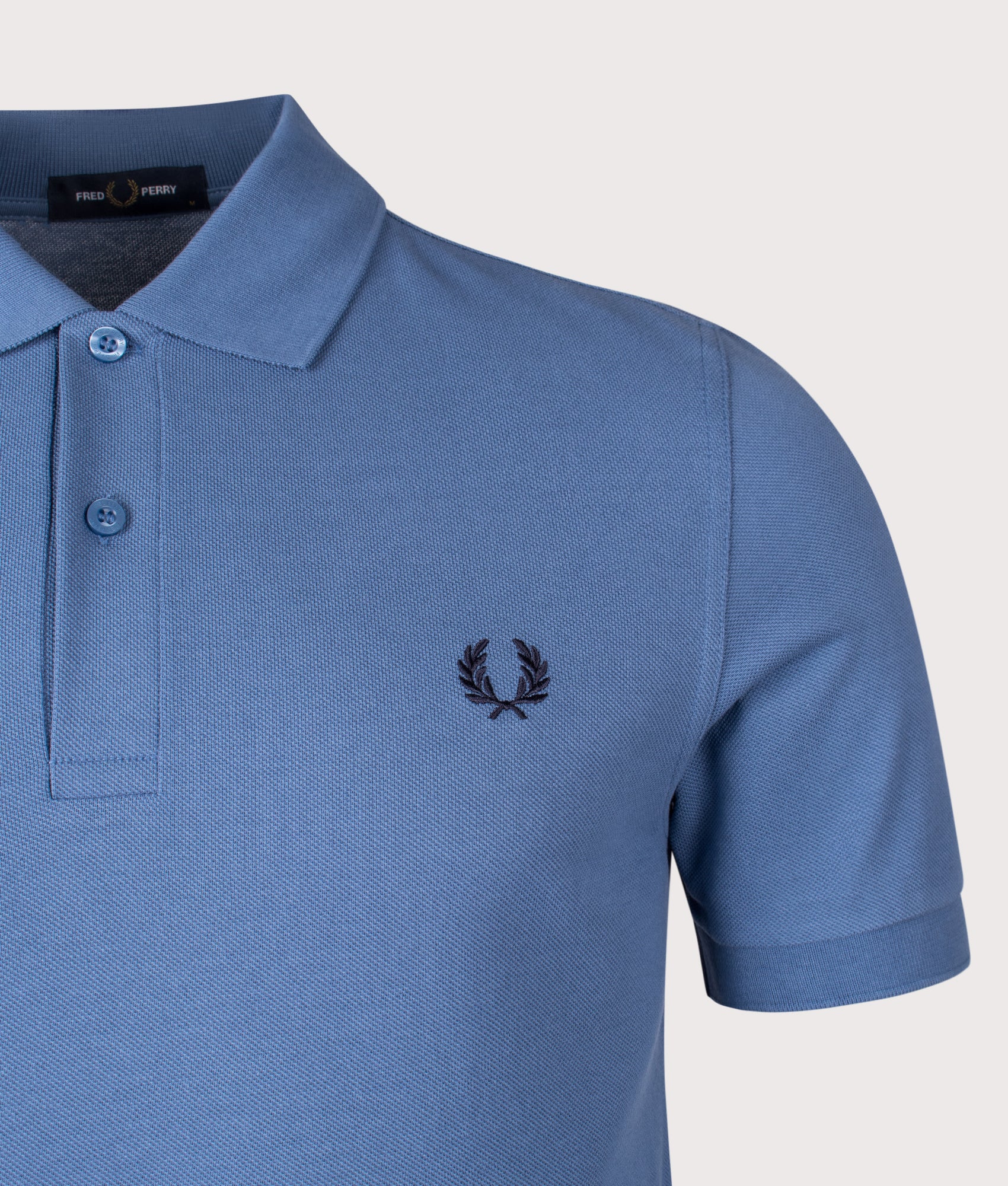 Fred Perry The Fred Perry Polo Shirt in Ace Blue and Tennis Blue at EQVVS Menswear. Detail shot.