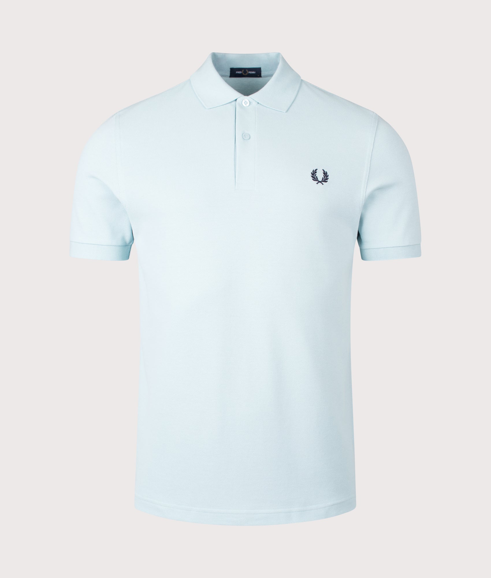 The Fred Perry Polo Shirt in Ball Boy Blue & Dark Airforce by Fred Perry. Shot by EQVVS. Front shot.