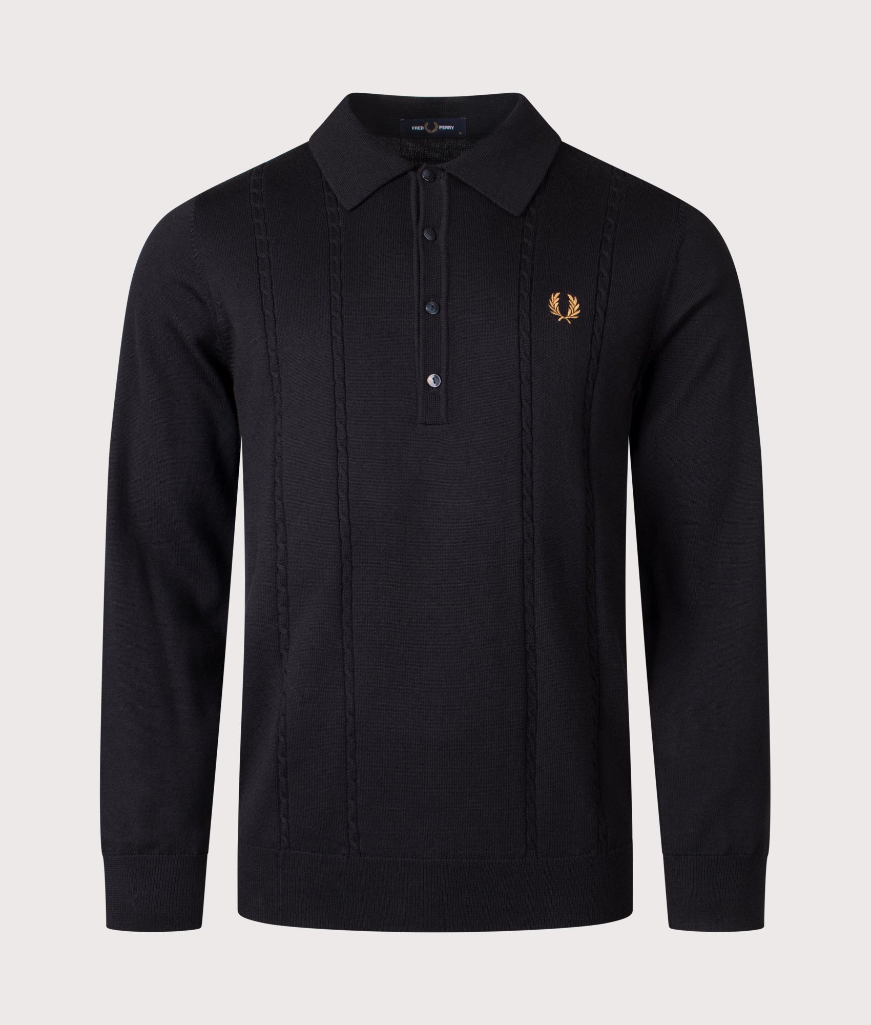 Fred Perry Long Sleeve Cable Knitted Polo Shirt in Black at EQVVS Menswear. Front shot.