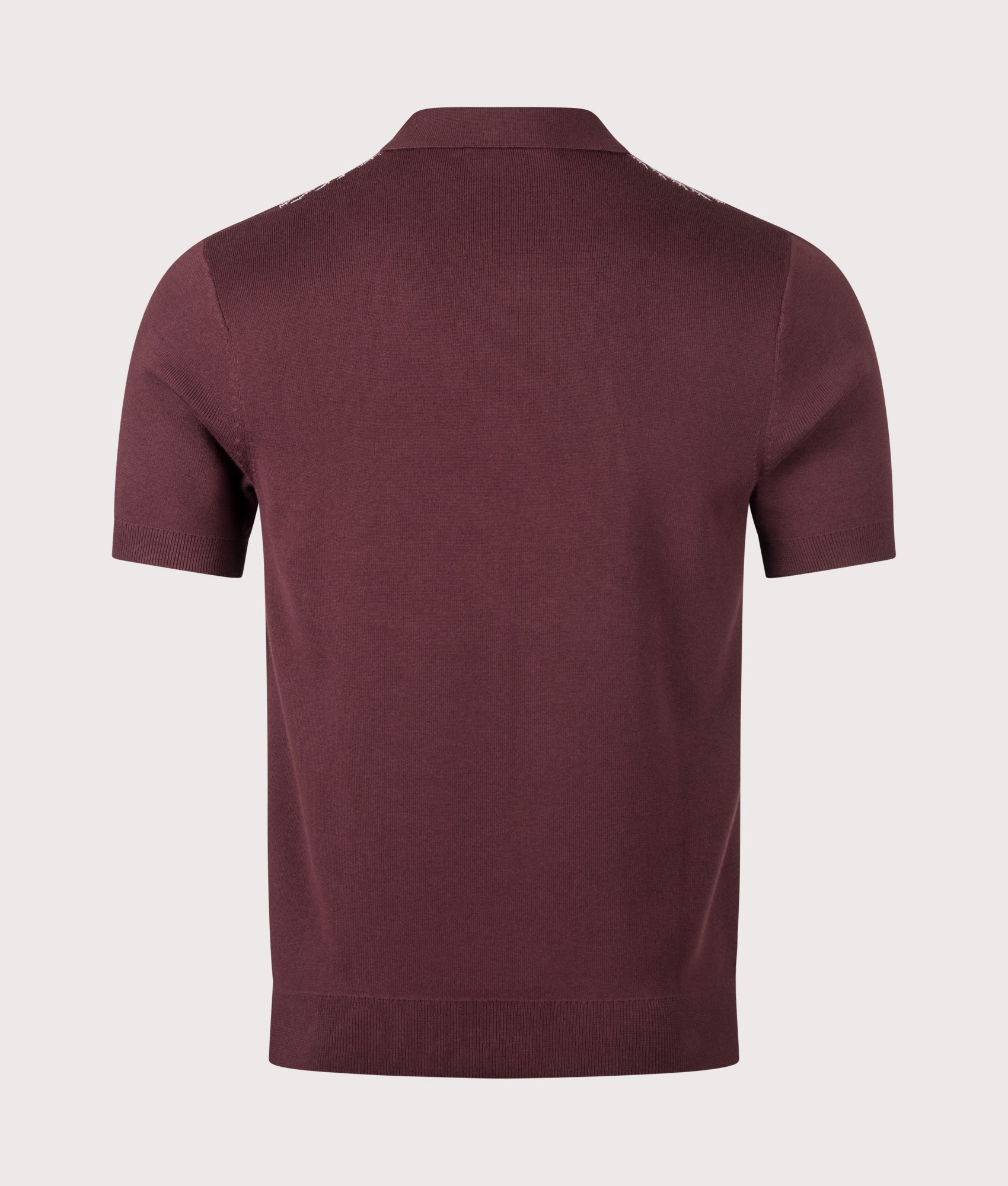 Fred Perry Panel Detail Knitted Polo Shirt in Oxblood at EQVVS Menswear. Back shot.