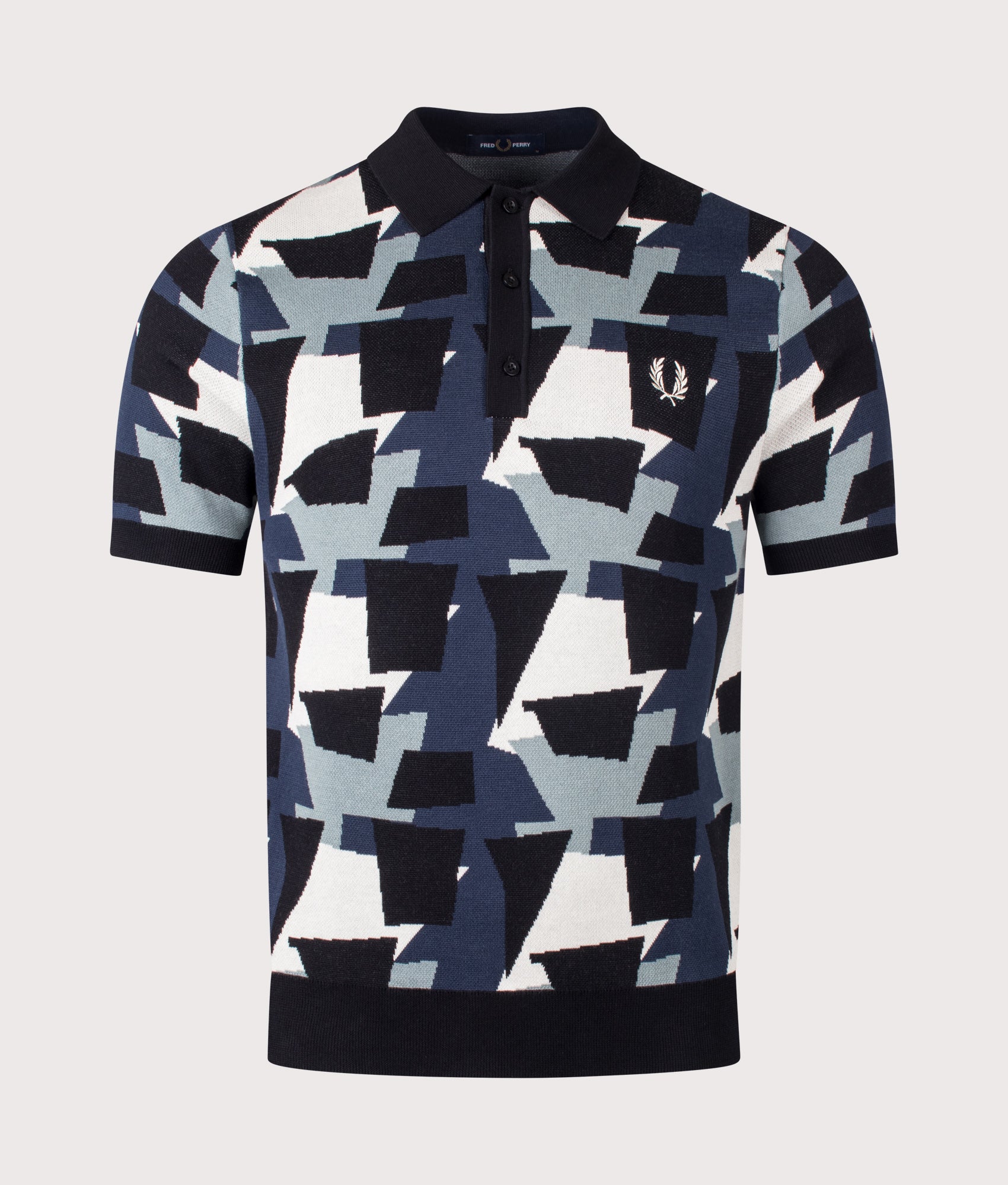 Fred Perry Fragment Jacquard Knit Polo Shirt in Black at EQVVS Menswear. Front shot.
