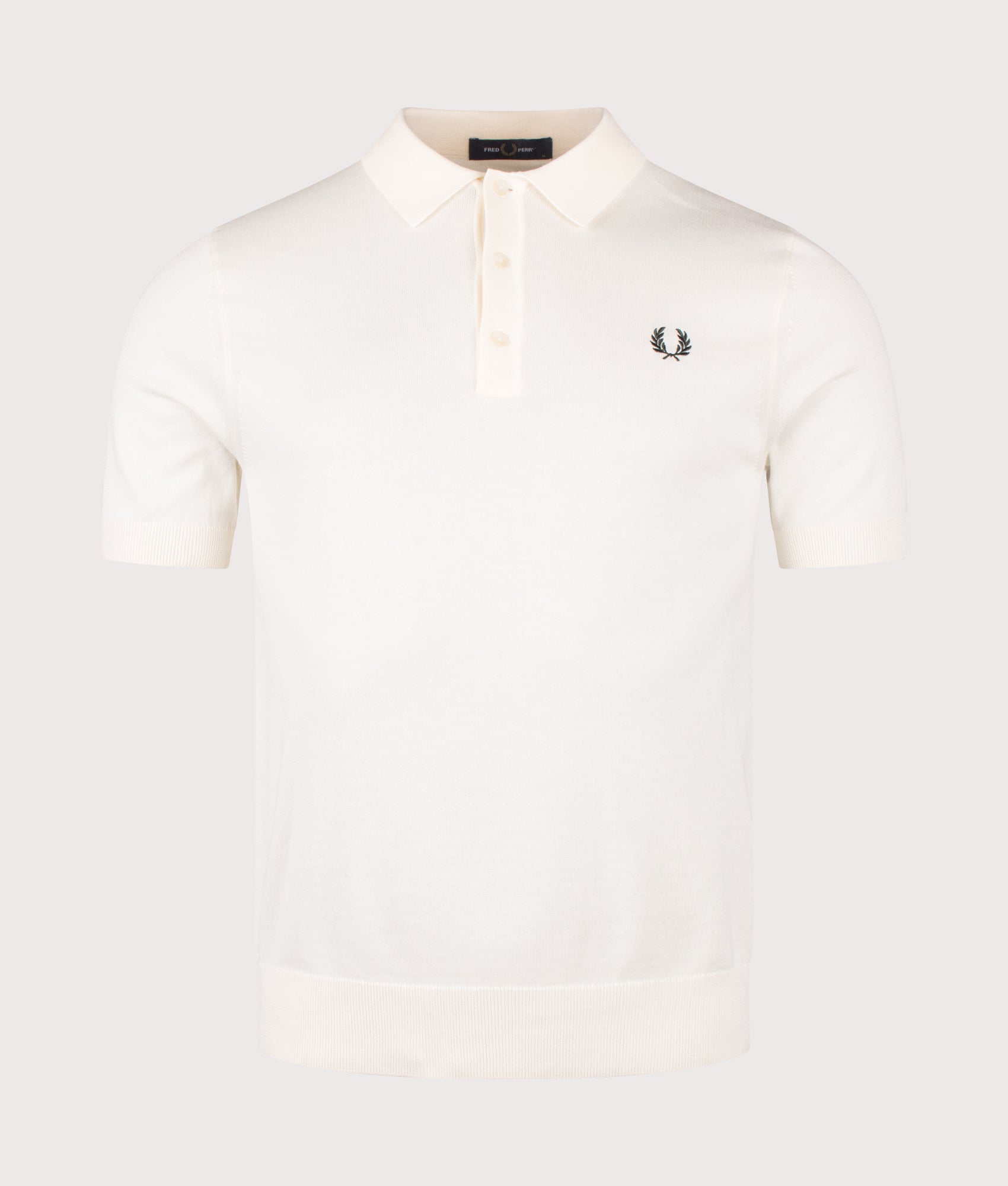 Fred Perry Long Staple Cotton Knitted Polo Shirt in Ecru at EQVVS Menswear. Front shot.