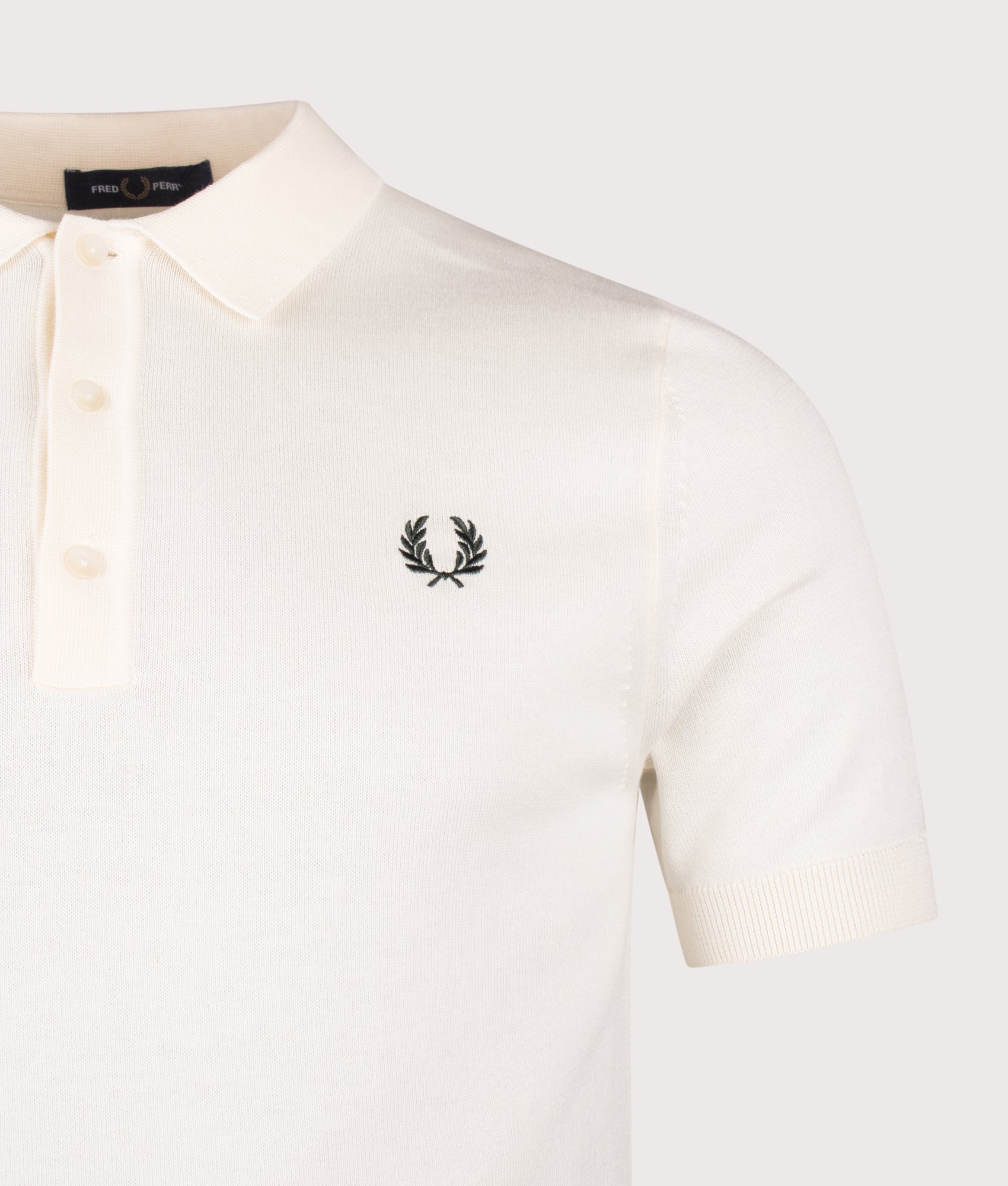 Fred Perry Long Staple Cotton Knitted Polo Shirt in Ecru at EQVVS Menswear. Detail shot.