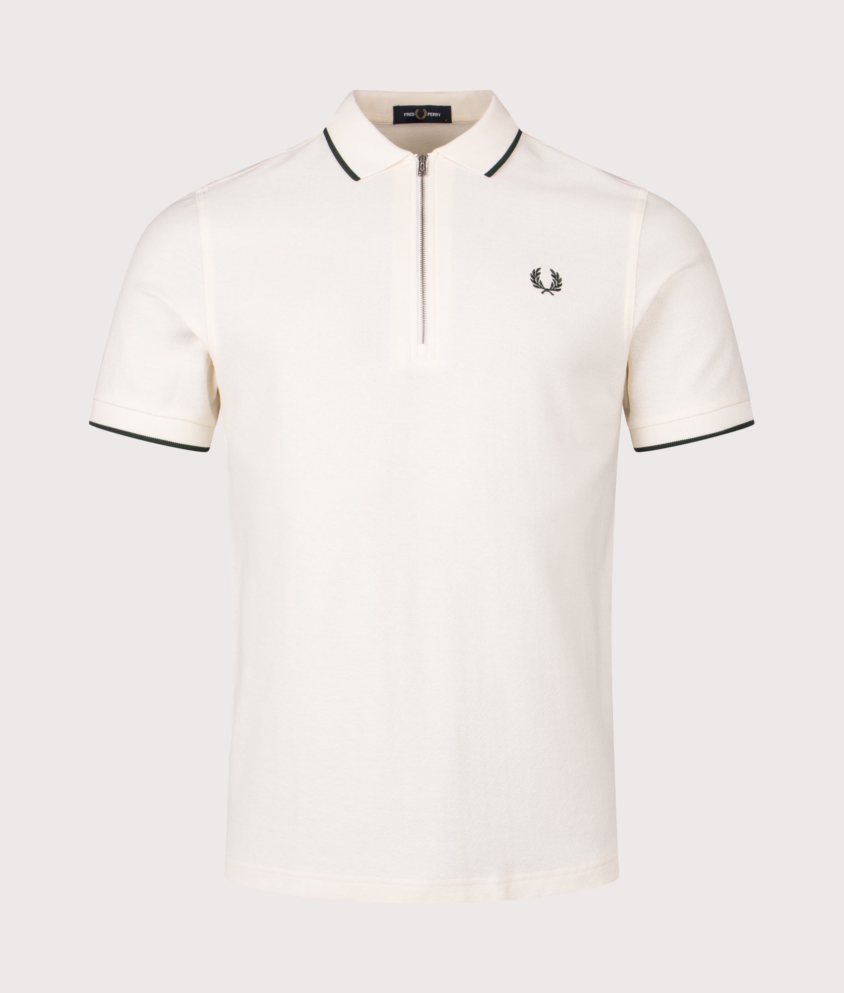 Fred Perry Crepe Piqué Polo Shirt in Ecru at EQVVS Menswear. Front shot.