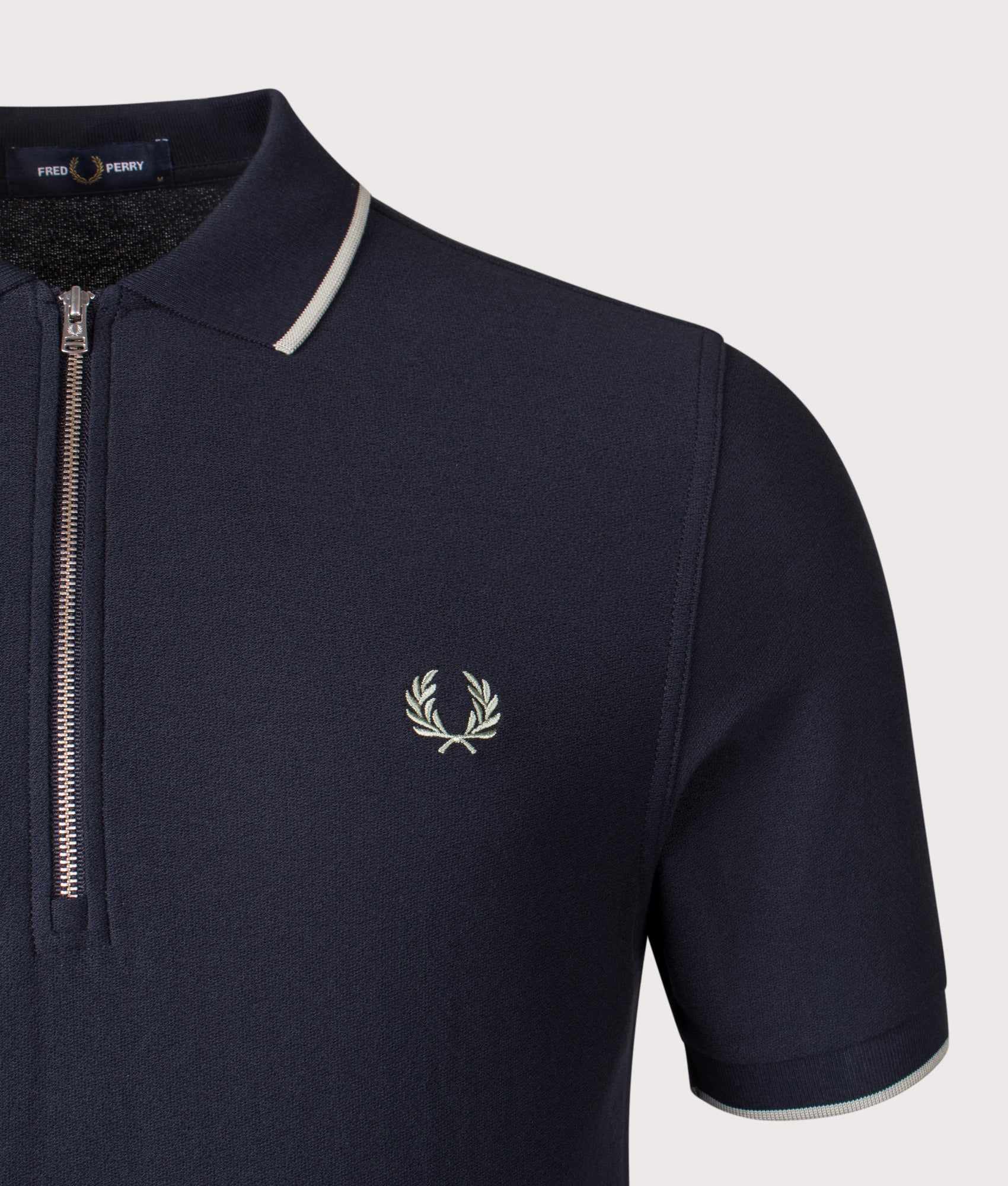 Fred Perry Crepe Piqué Polo Shirt in Navy at EQVVS Menswear. Detail shot.