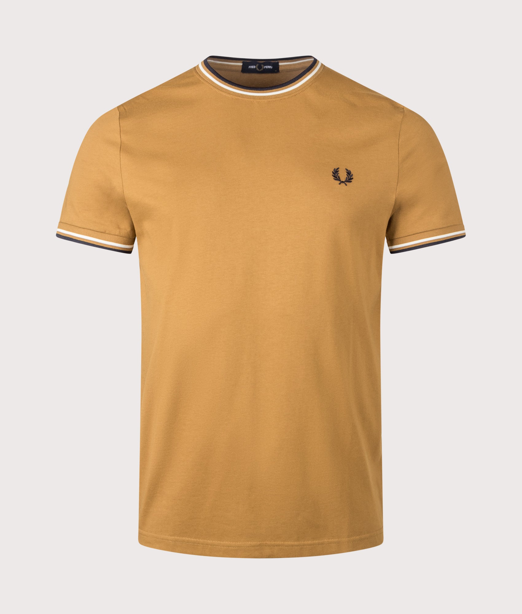 Fred Perry Twin Tipped T-Shirt in Dark Caramel, Ecru and Navy at EQVVS Menswear. Front shot.
