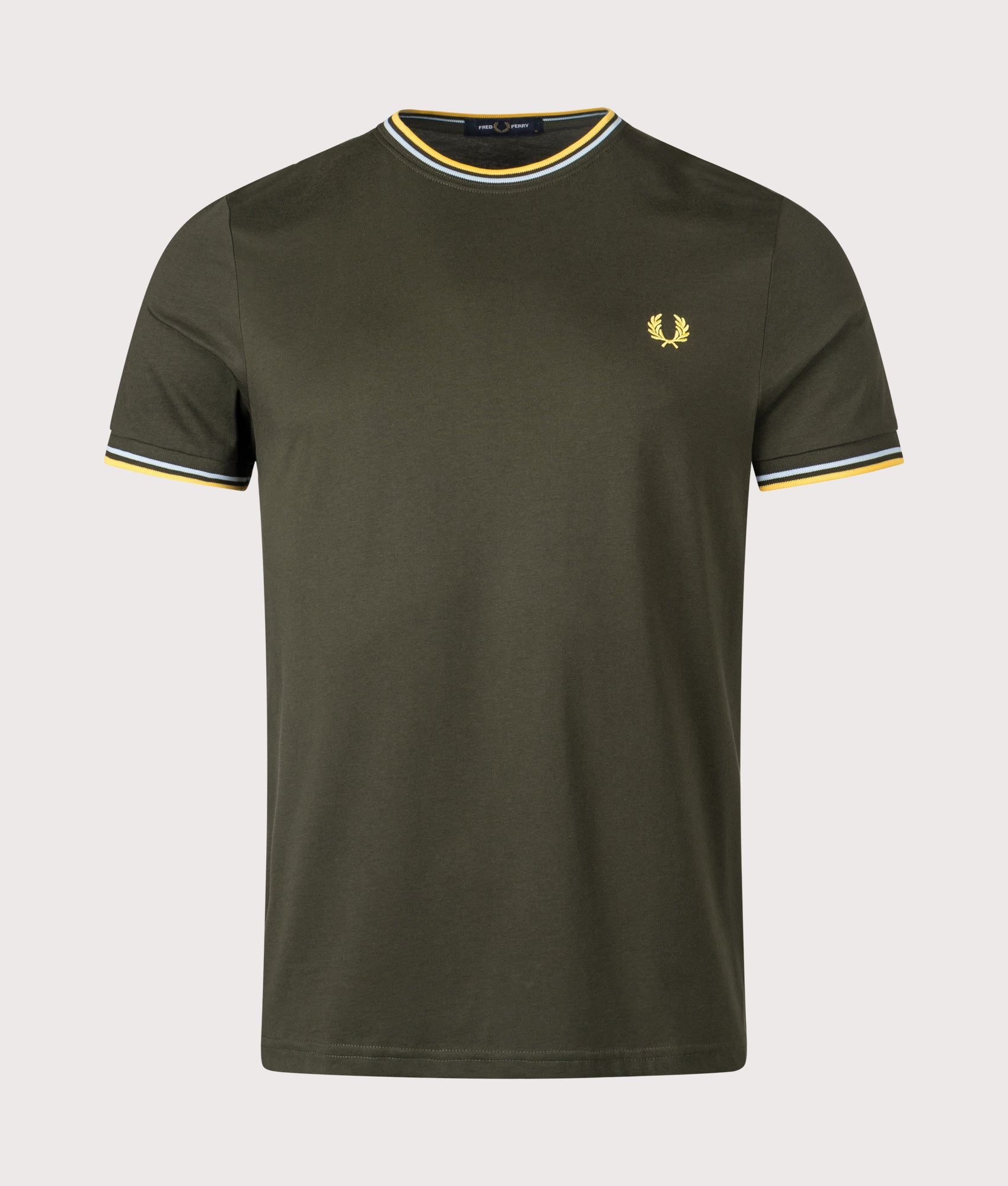 Fred Perry Twin Tipped T-Shirt in Hunting Green, Light Ice and Lemon Barley at EQVVS Menswear. Front shot.