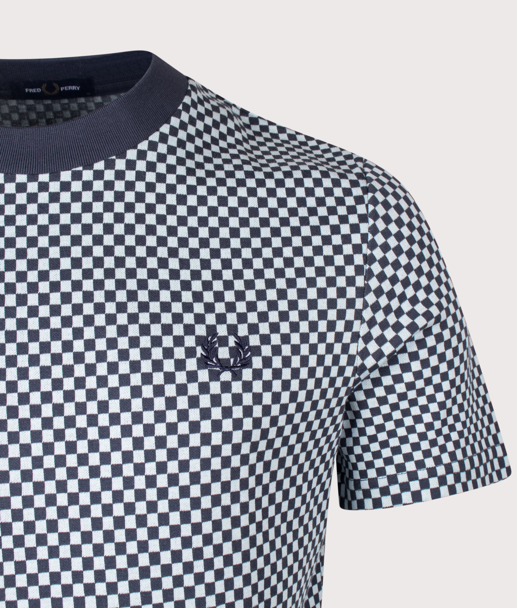 Fred Perry Chequerboard Jacquard T-Shirt in Dark Airforce at EQVVS Menswear. Detail shot.