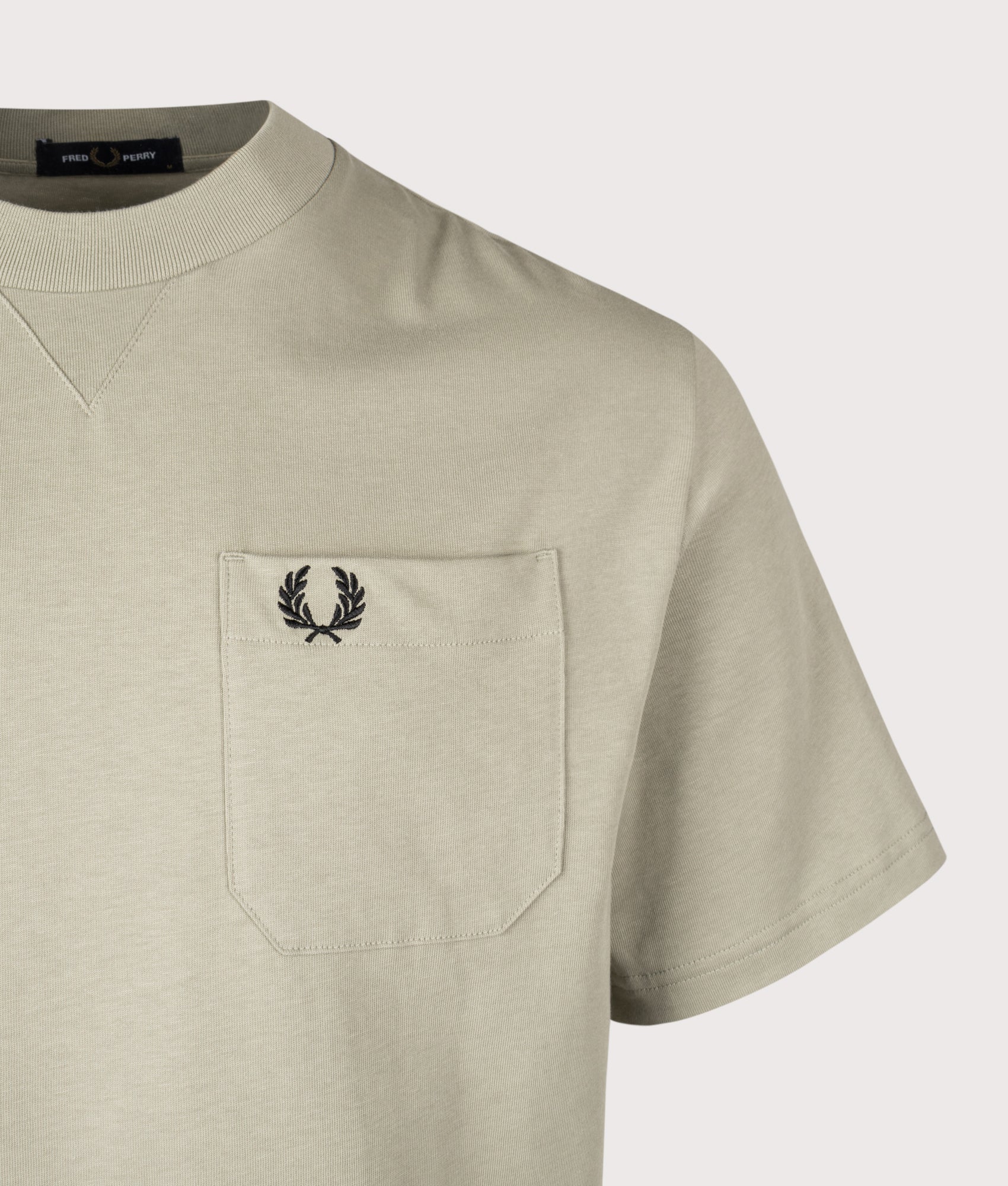 Fred Perry Relaxed Fit Pocket Detail T-Shirt in Seagrass at EQVVS Menswear. Detail shot
